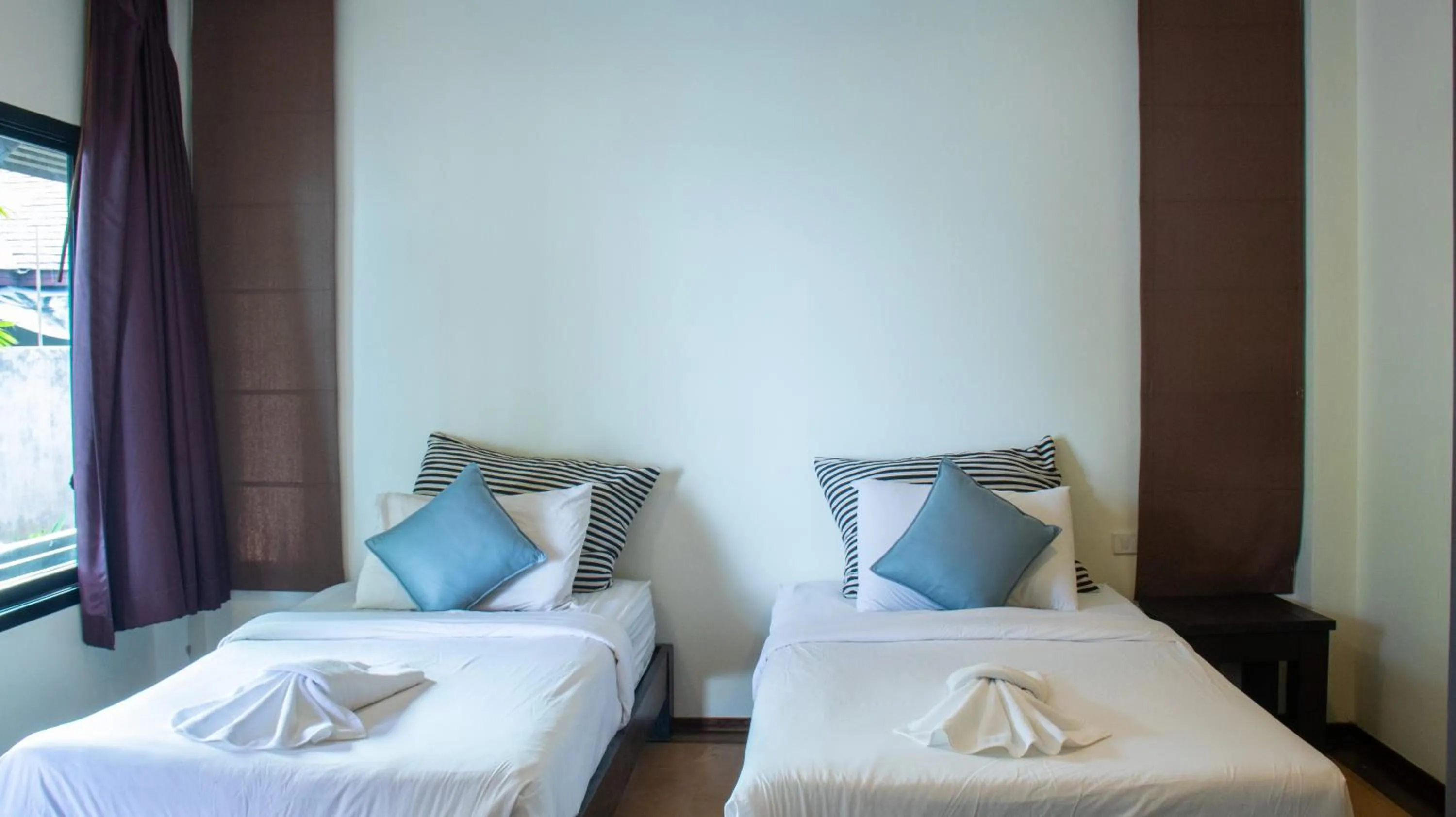 Bed in Chidlom Resort