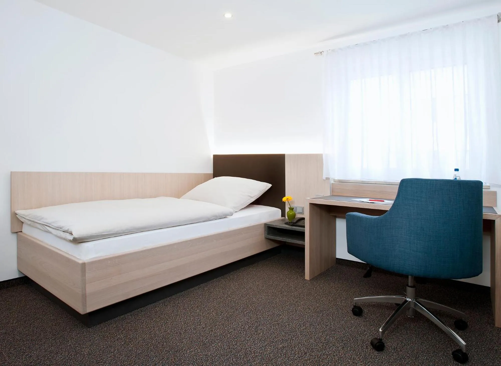 Photo of the whole room, Bed in Hotel Käferstein garni