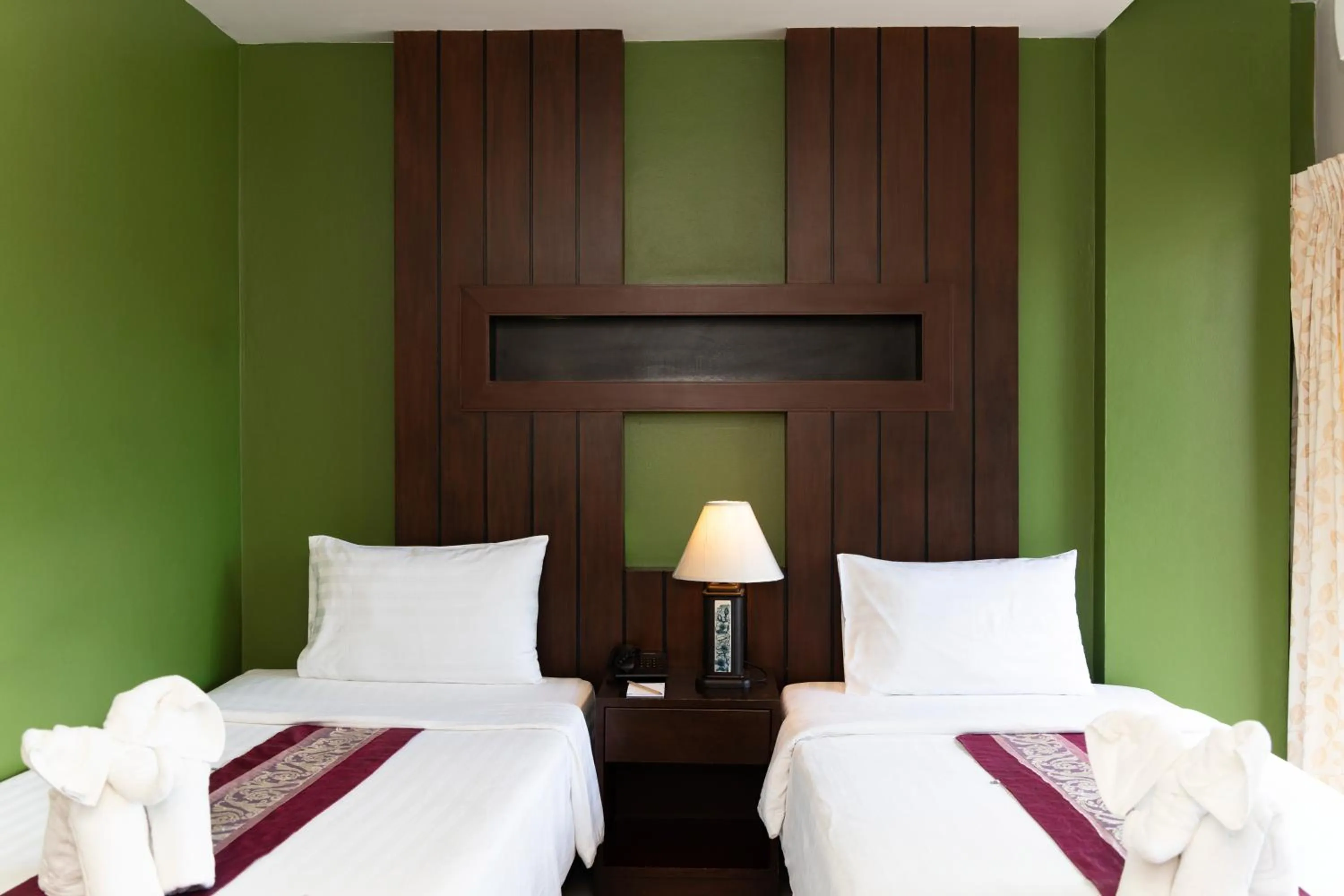 Bed in Gu Hotel Patong