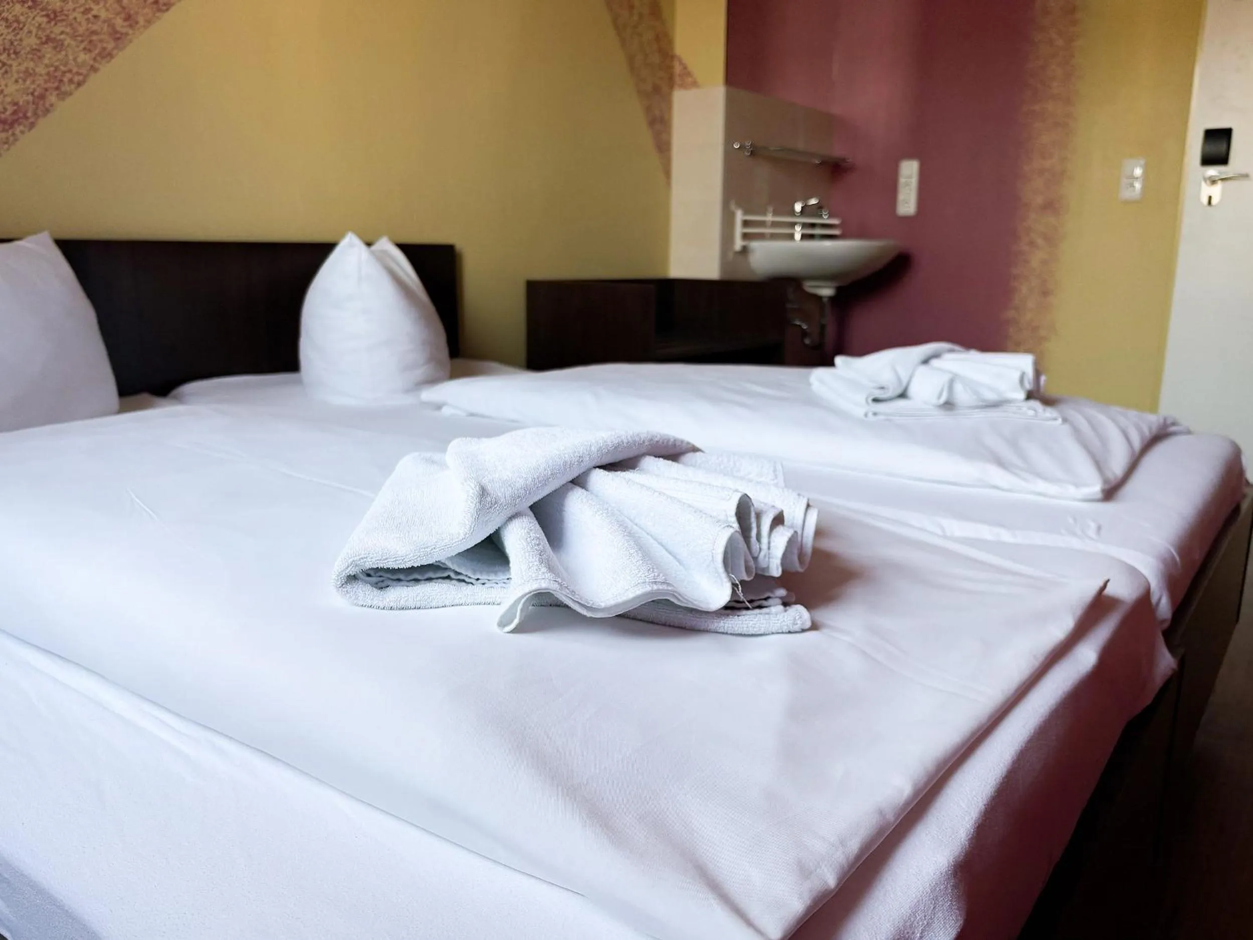 Bed in HOLI City Apart Hotel Berlin