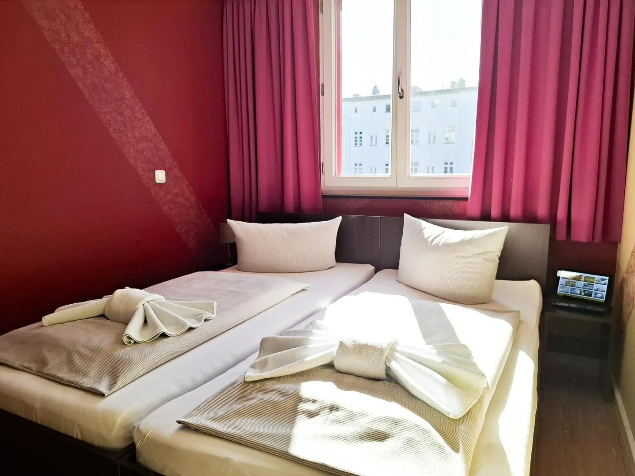 Bed in HOLI City Apart Hotel Berlin