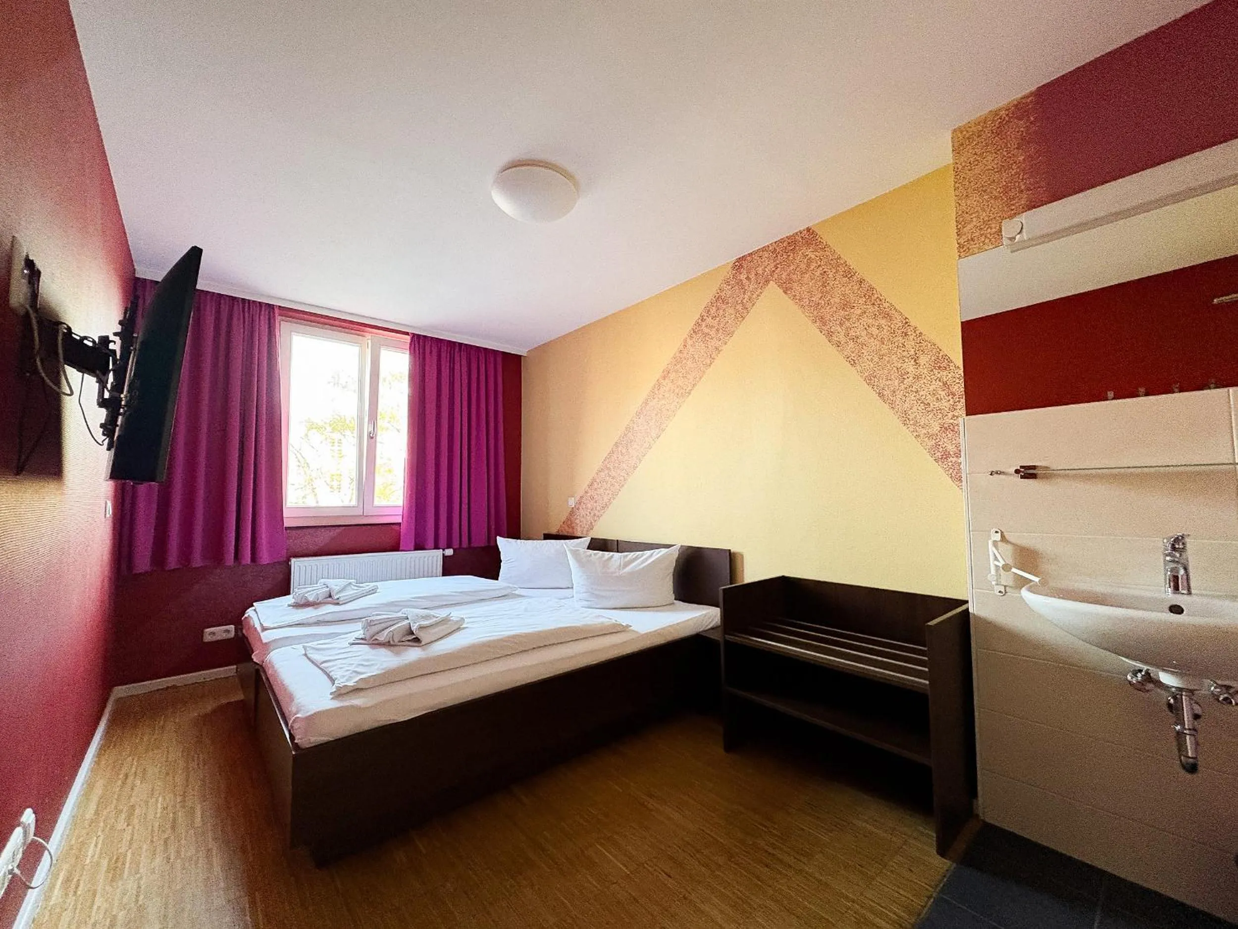 Photo of the whole room, Bed in HOLI City Apart Hotel Berlin