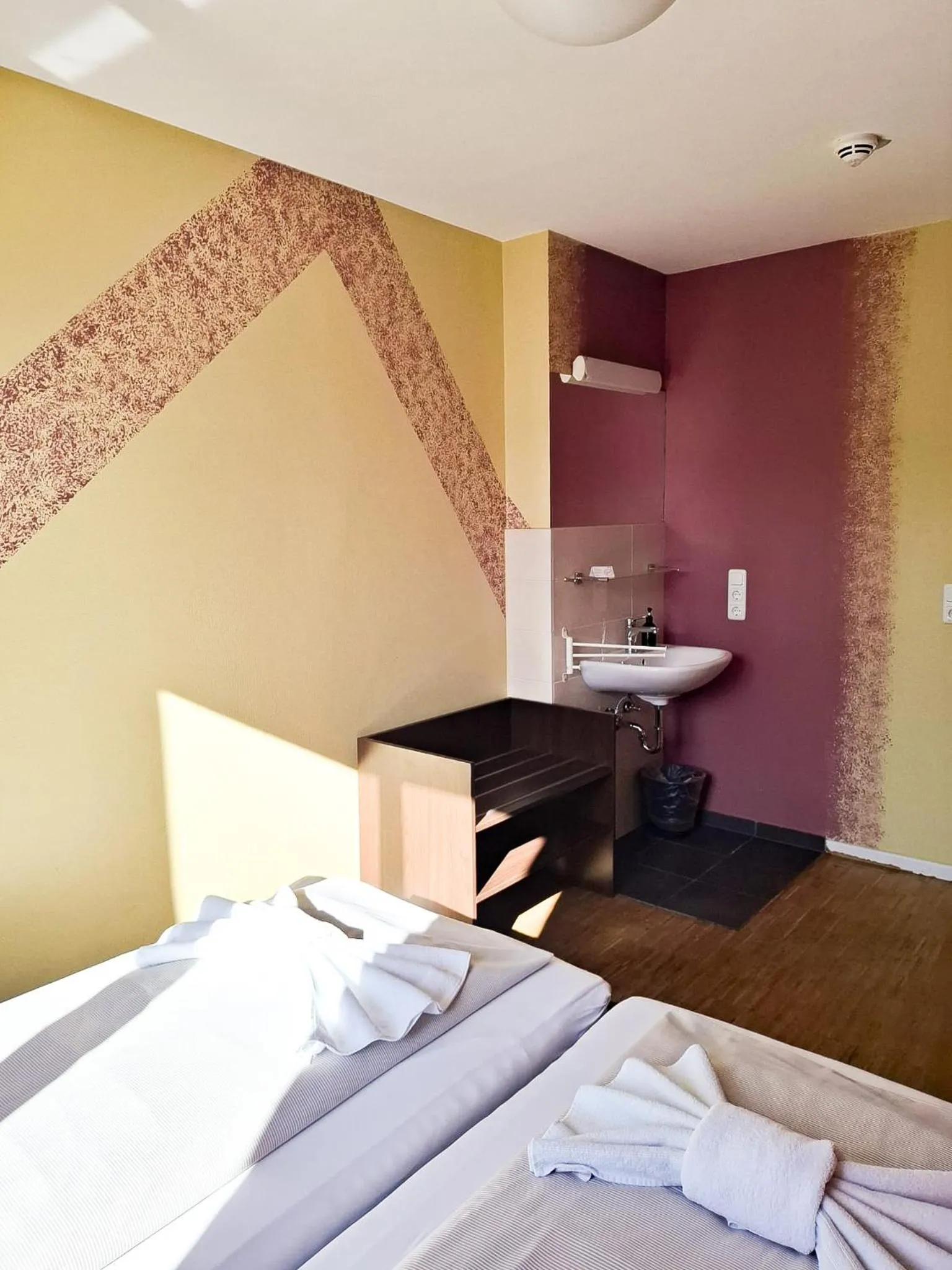 Bed in HOLI City Apart Hotel Berlin