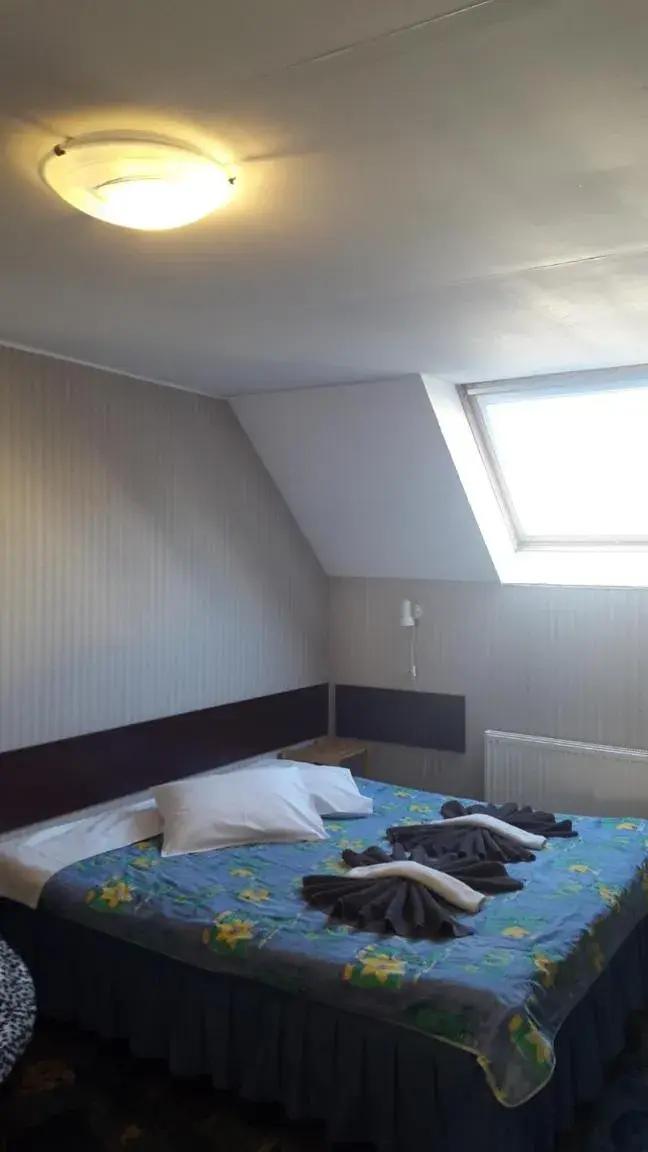 Basic Triple Room with Shared Bathroom in Terve Hostel Basic Triple Room with Shared Bathroom in Terve Hostel