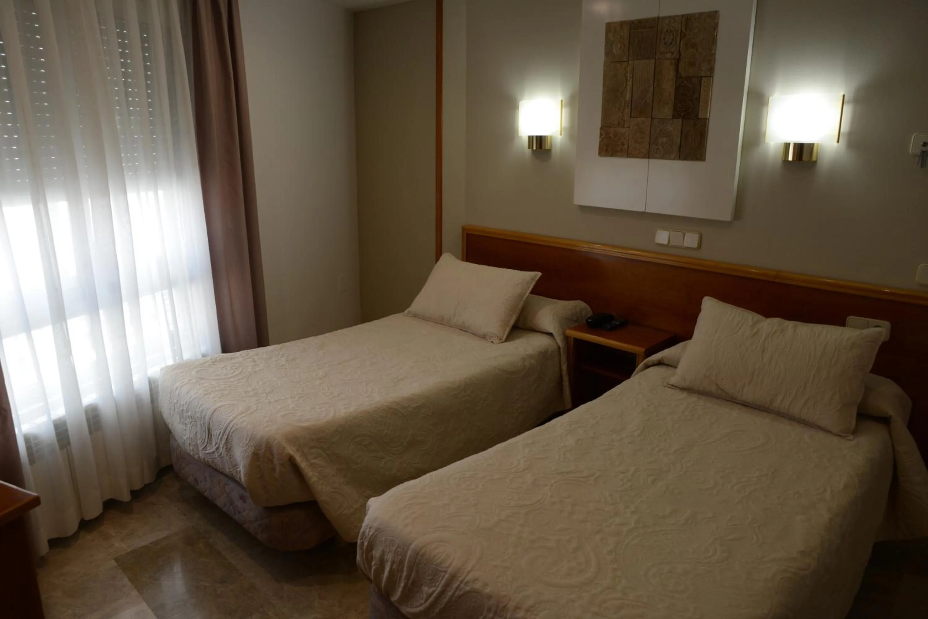 Bed in Hotel Escudero