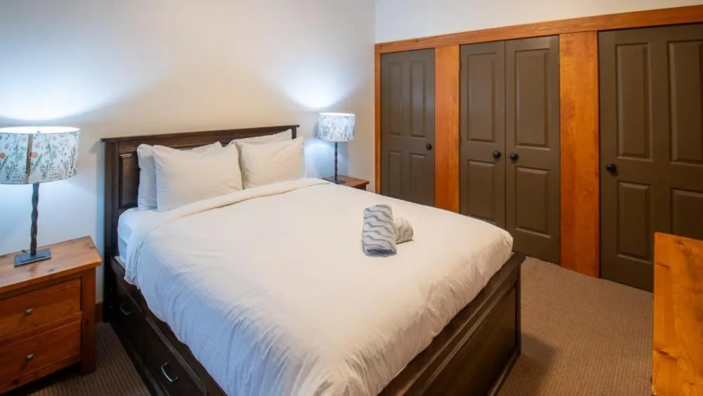 Bed in Timberline Lodges by Fernie Lodging Co