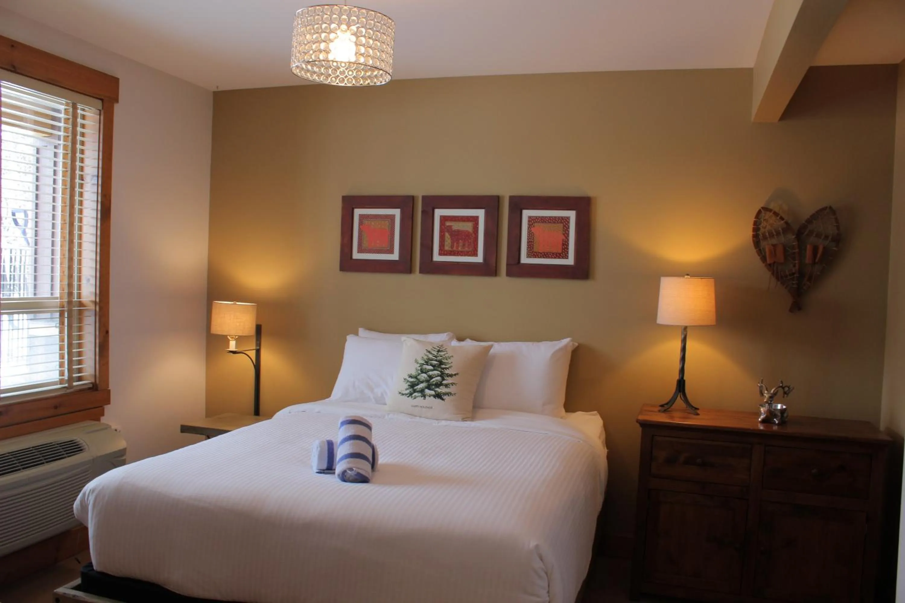 Bed in Timberline Lodges by Fernie Lodging Co