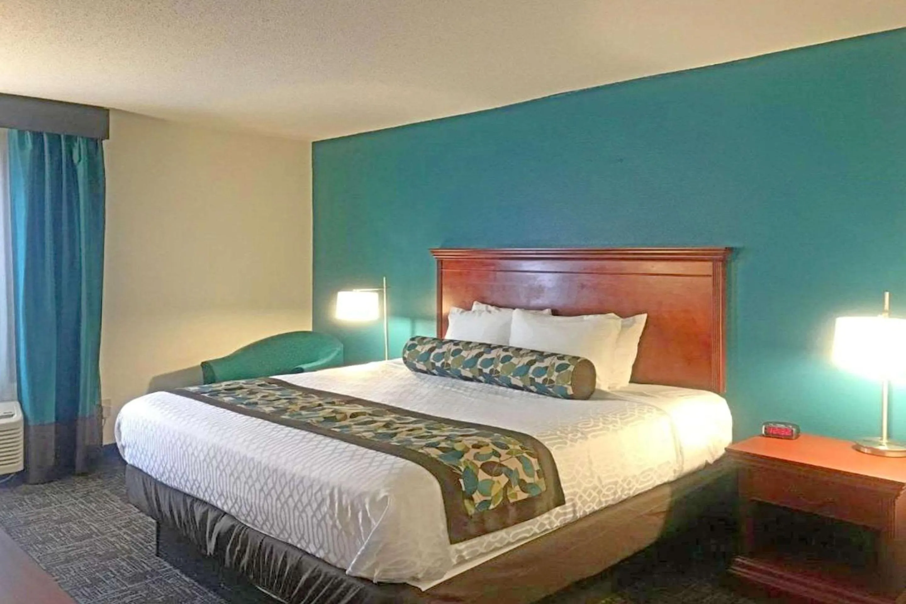 Bedroom in Rodeway Inn & Suites