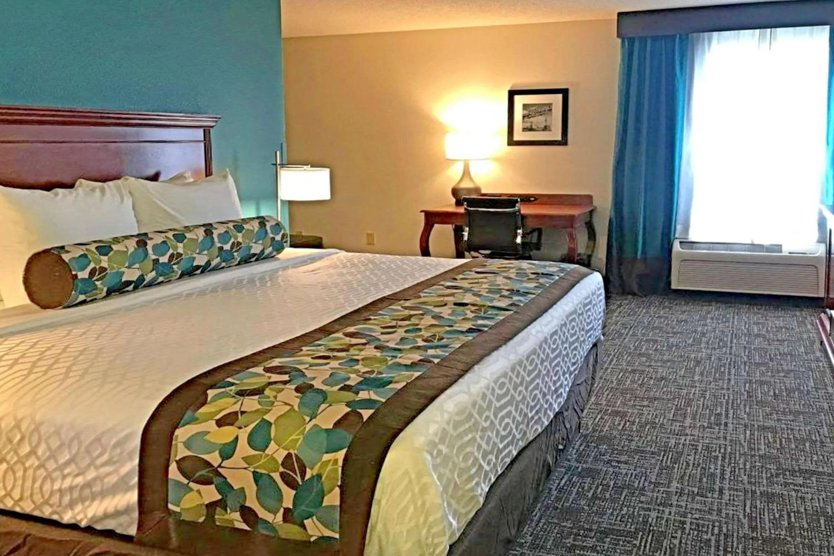 Bedroom in Rodeway Inn & Suites