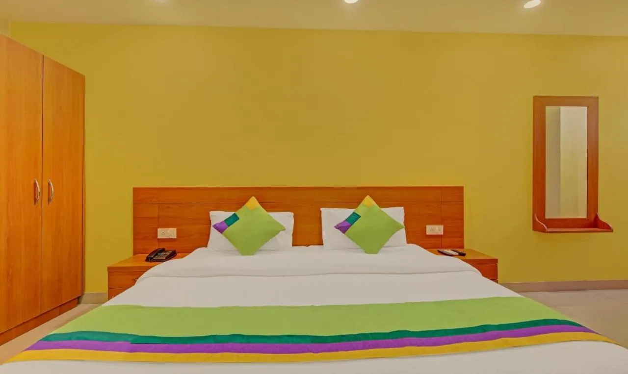 Bed in Hotel TMS Residency