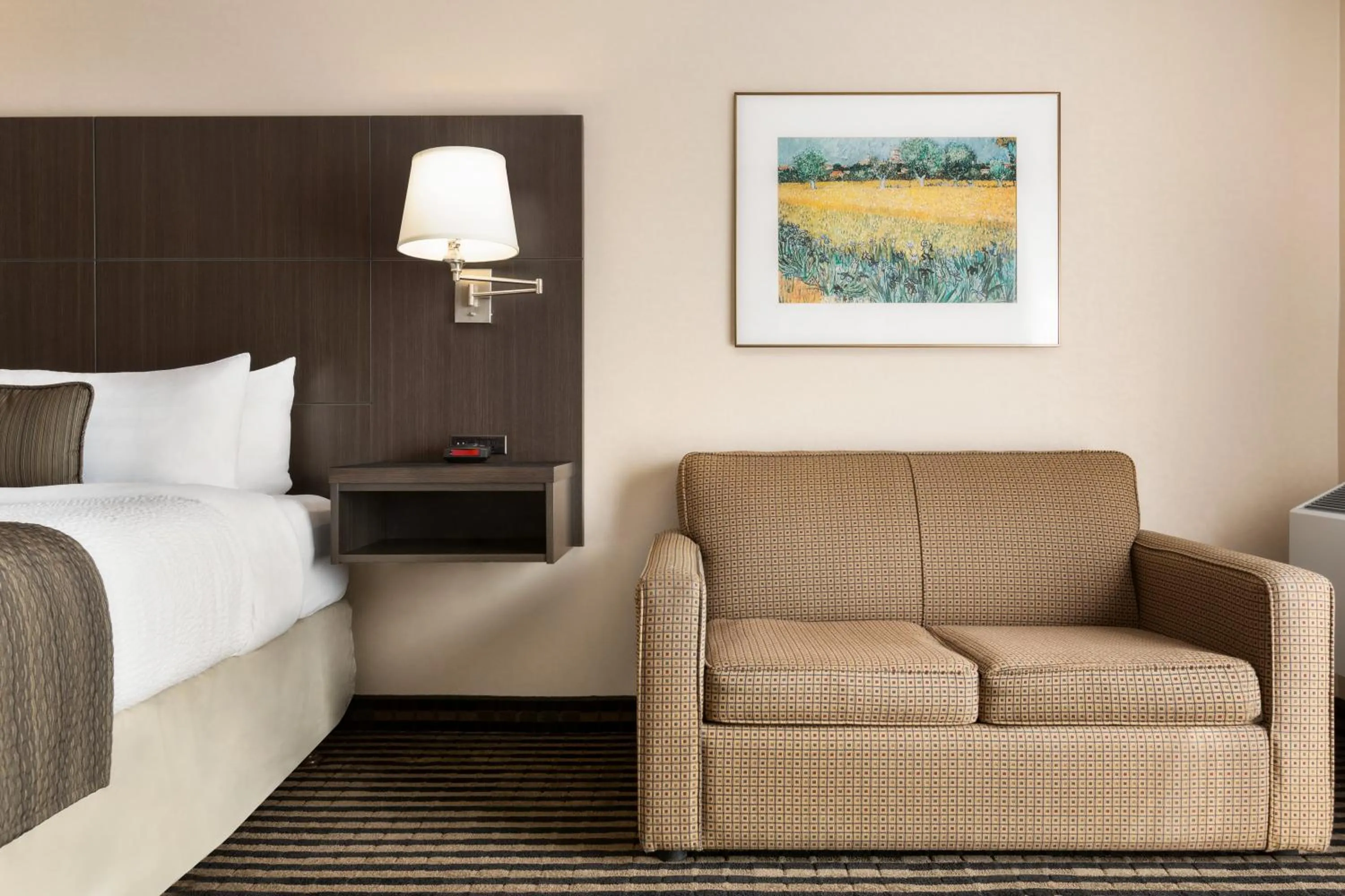 Seating area, Bed in Days Inn by Wyndham Miramichi NB