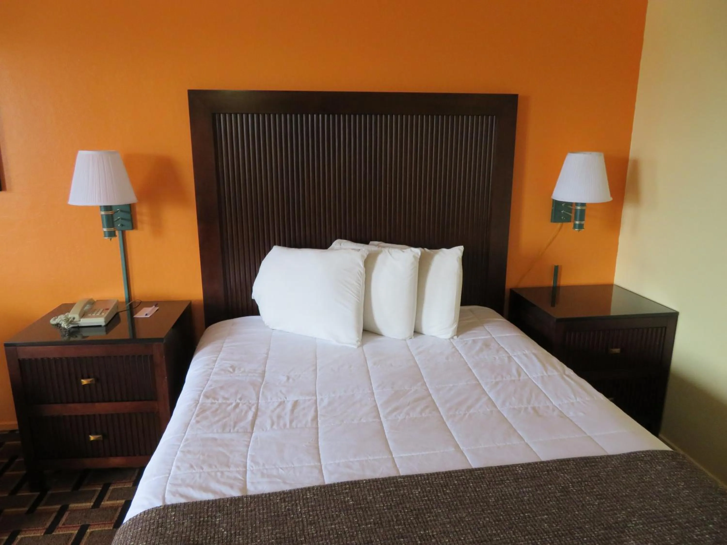 Bed in Royal Crest Motel