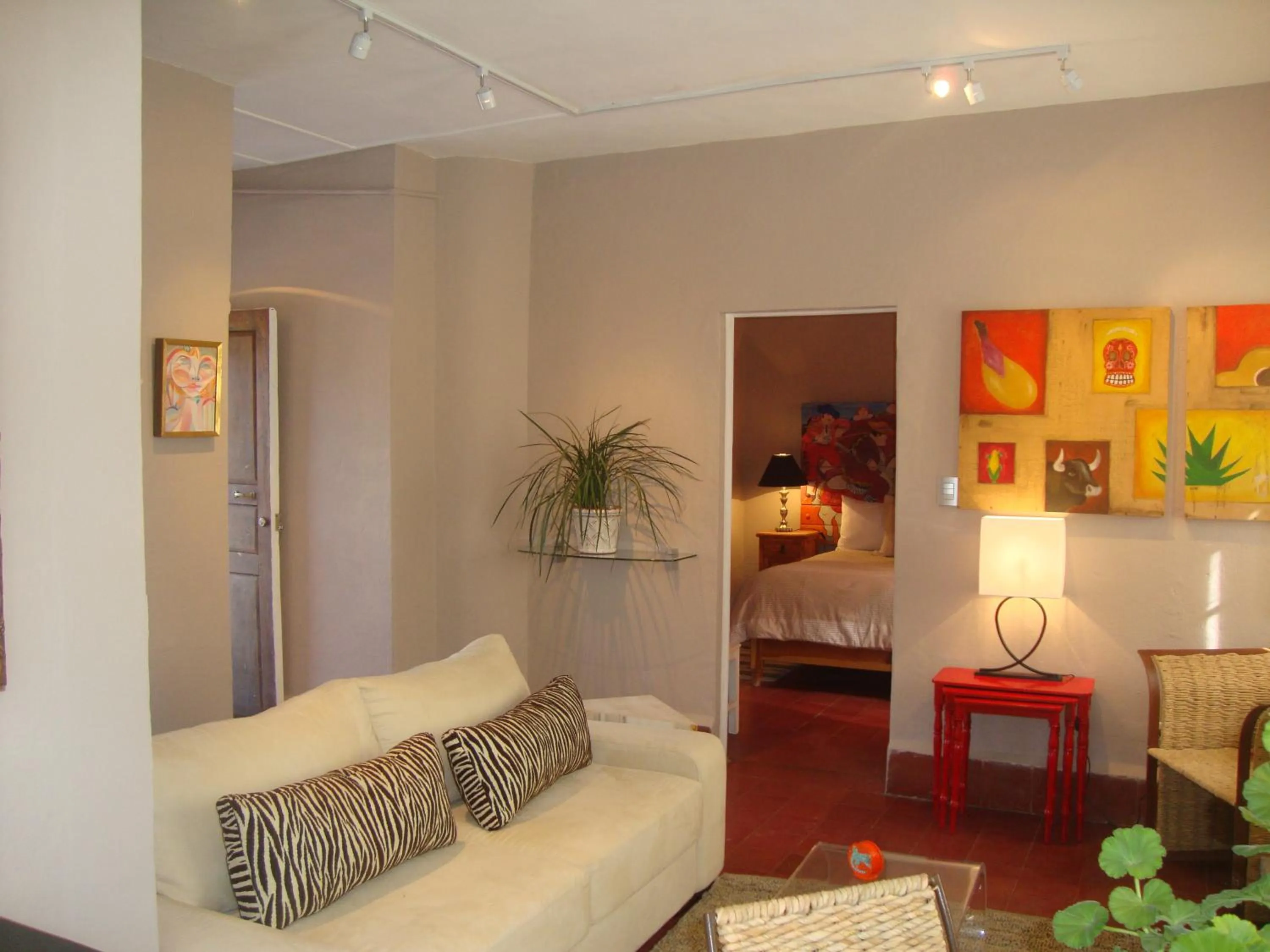 Living room, Bed in Suites Santo Domingo