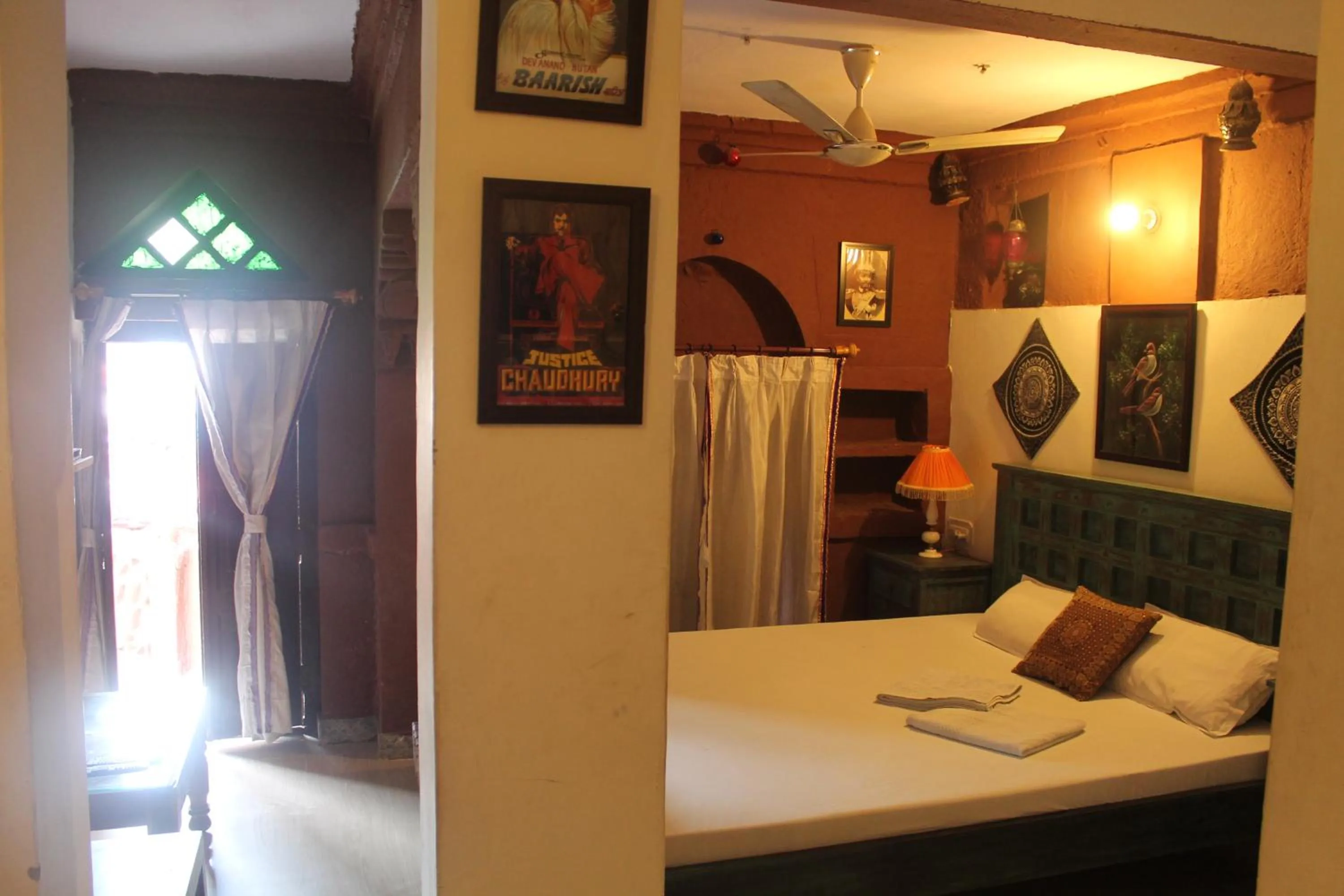 Bed in Kesar Heritage Boutique Home Stay