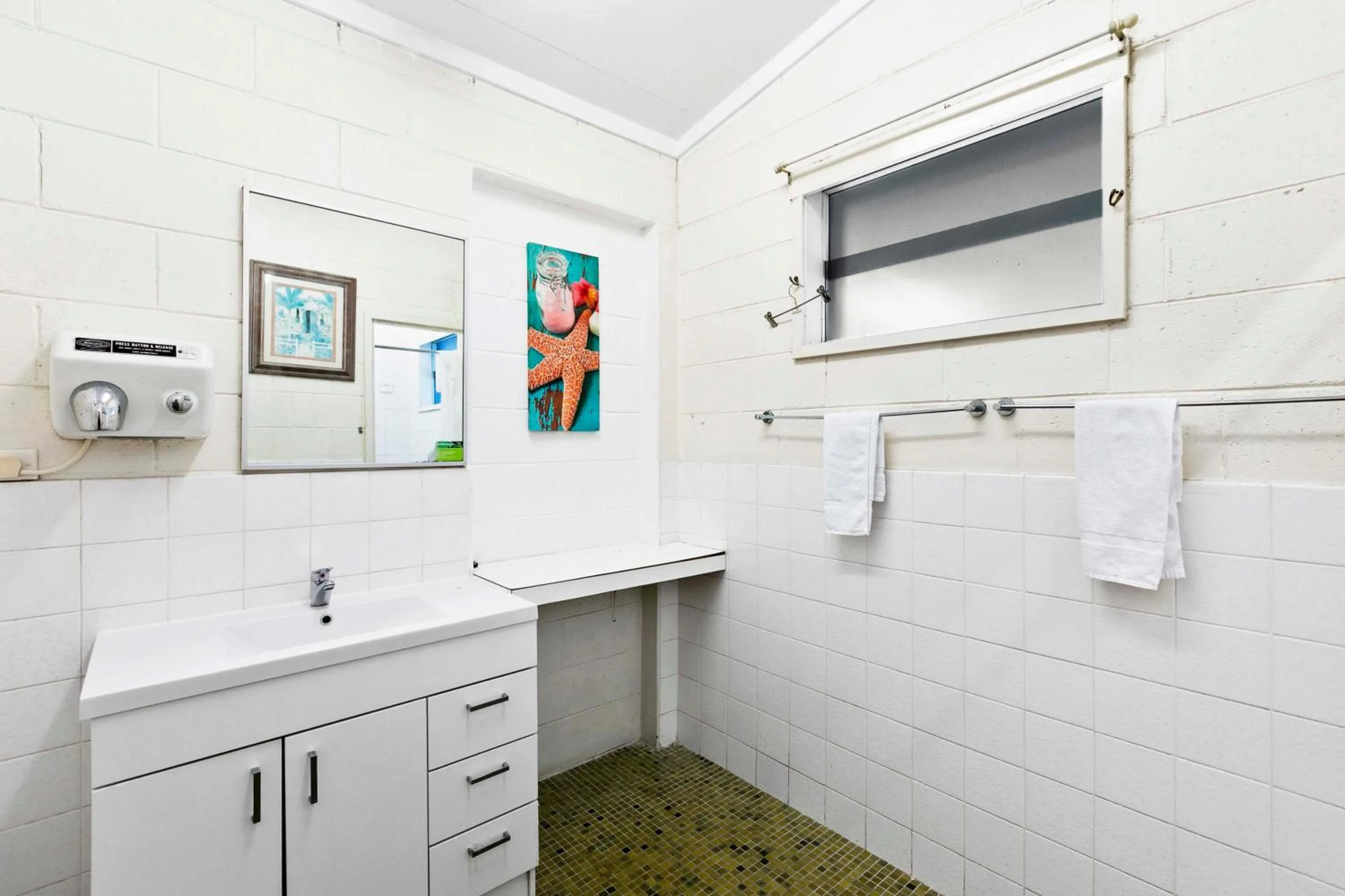 Bathroom in Arkana Motel Maryborough, SureStay Collection by Best Western