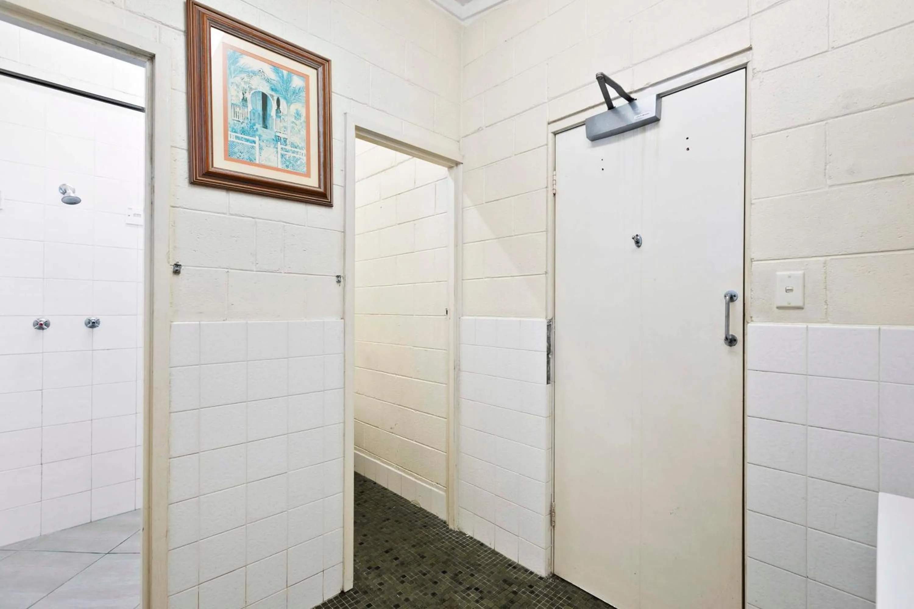Bathroom in Arkana Motel Maryborough, SureStay Collection by Best Western