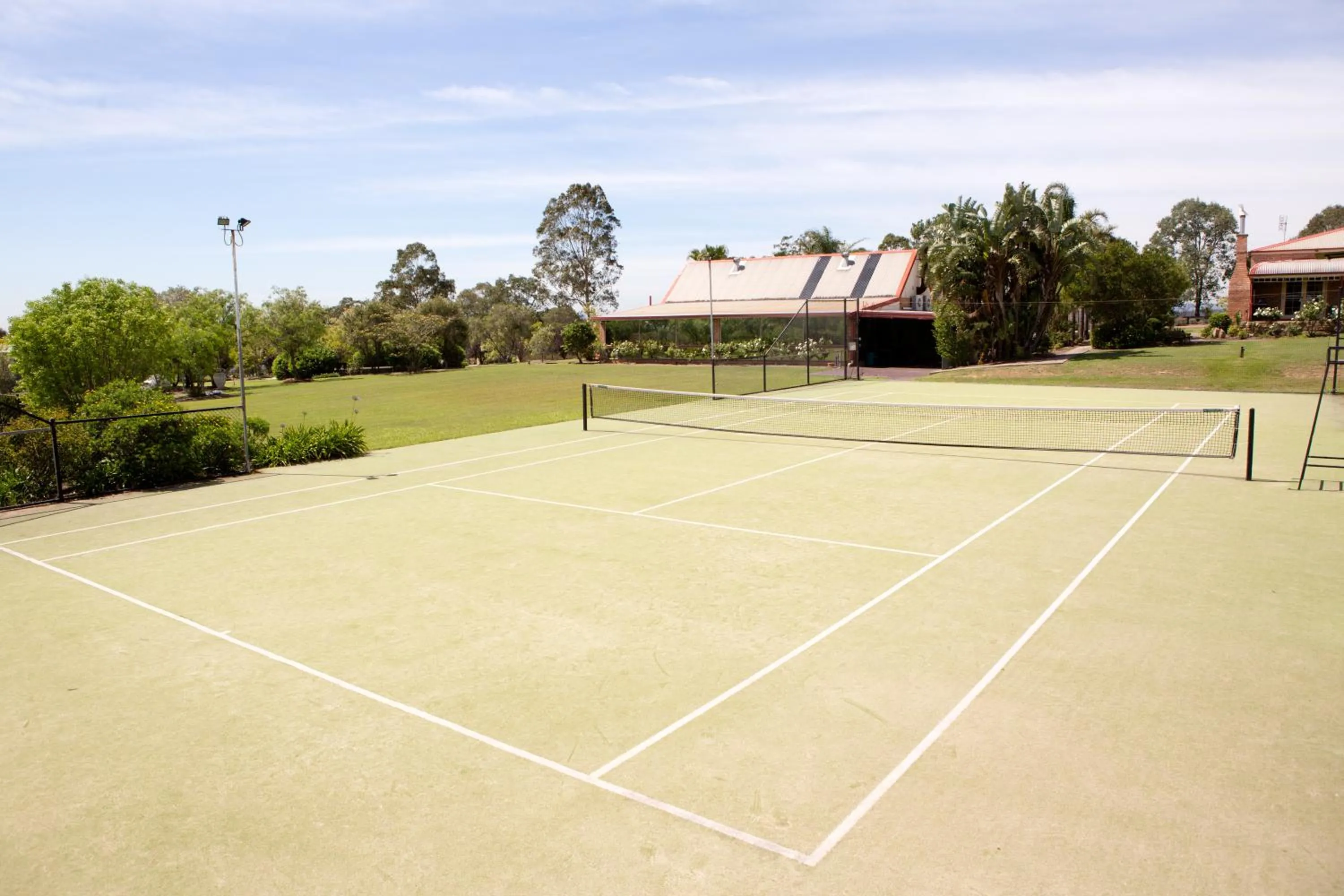 Tennis court in Bluebush Estate