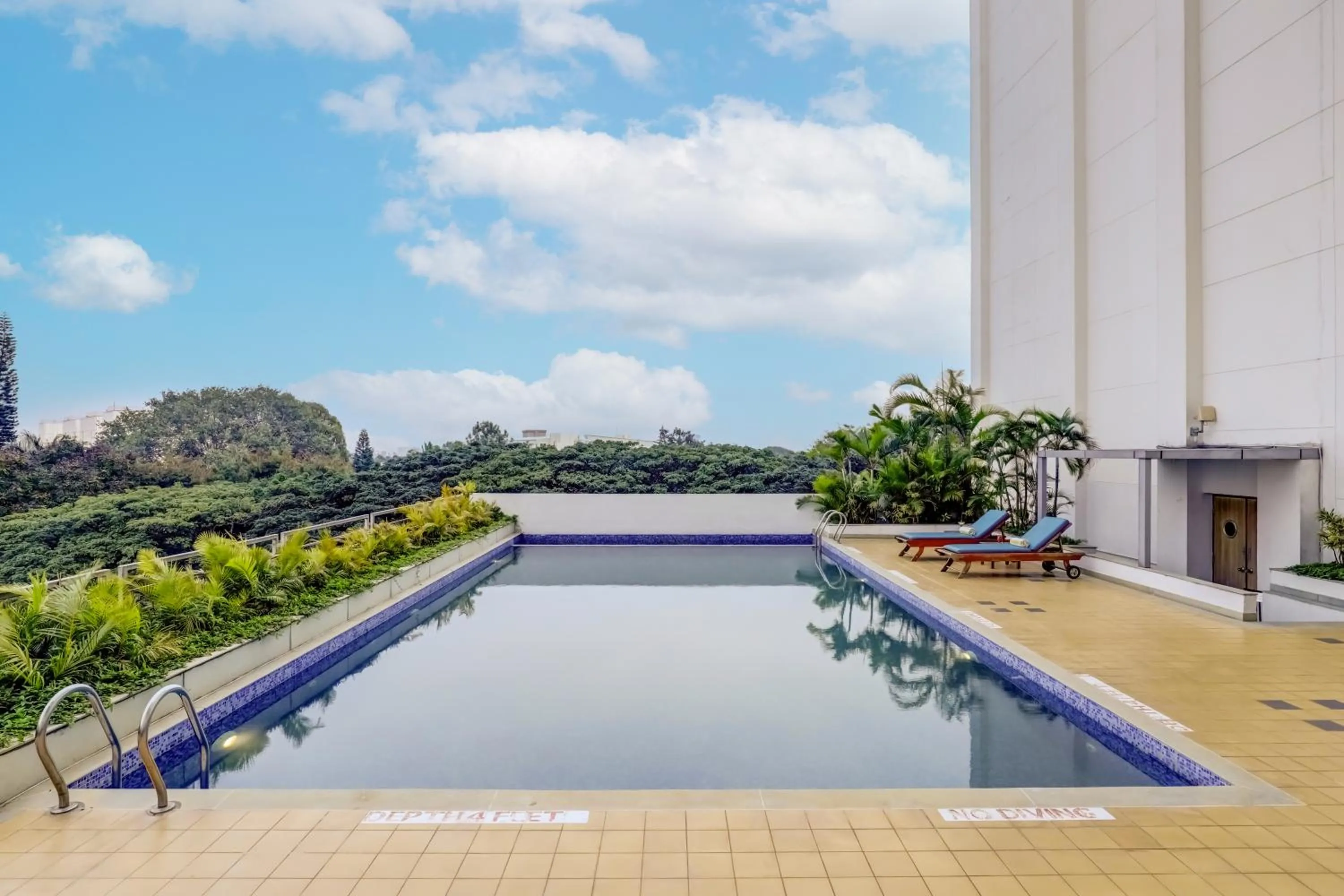 Swimming pool in Lemon Tree Hotel Whitefield, Bengaluru