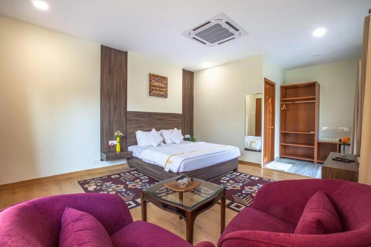 Bed in The Radha Ashok