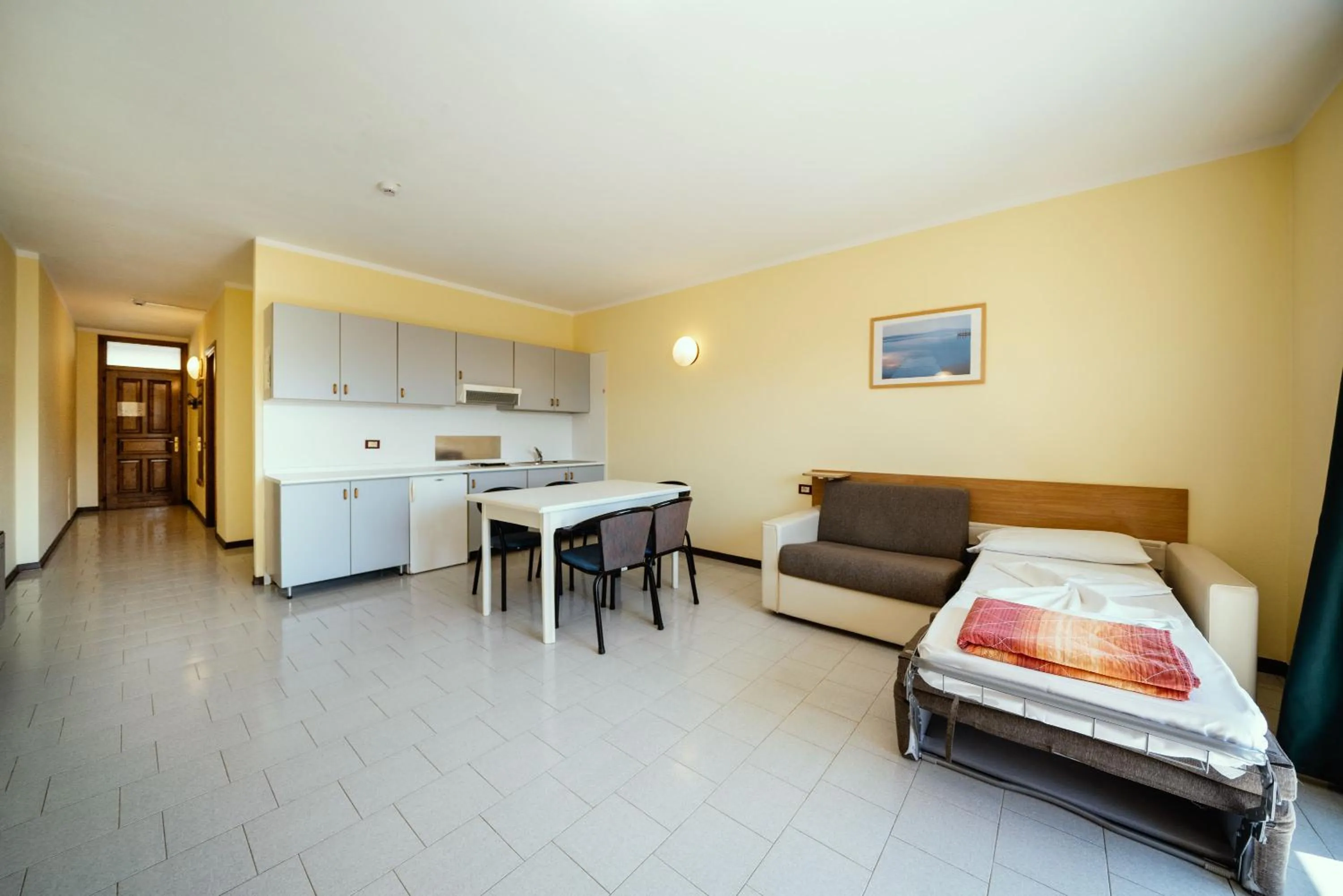 Kitchen or kitchenette, Bed in Hotel Residence Campi