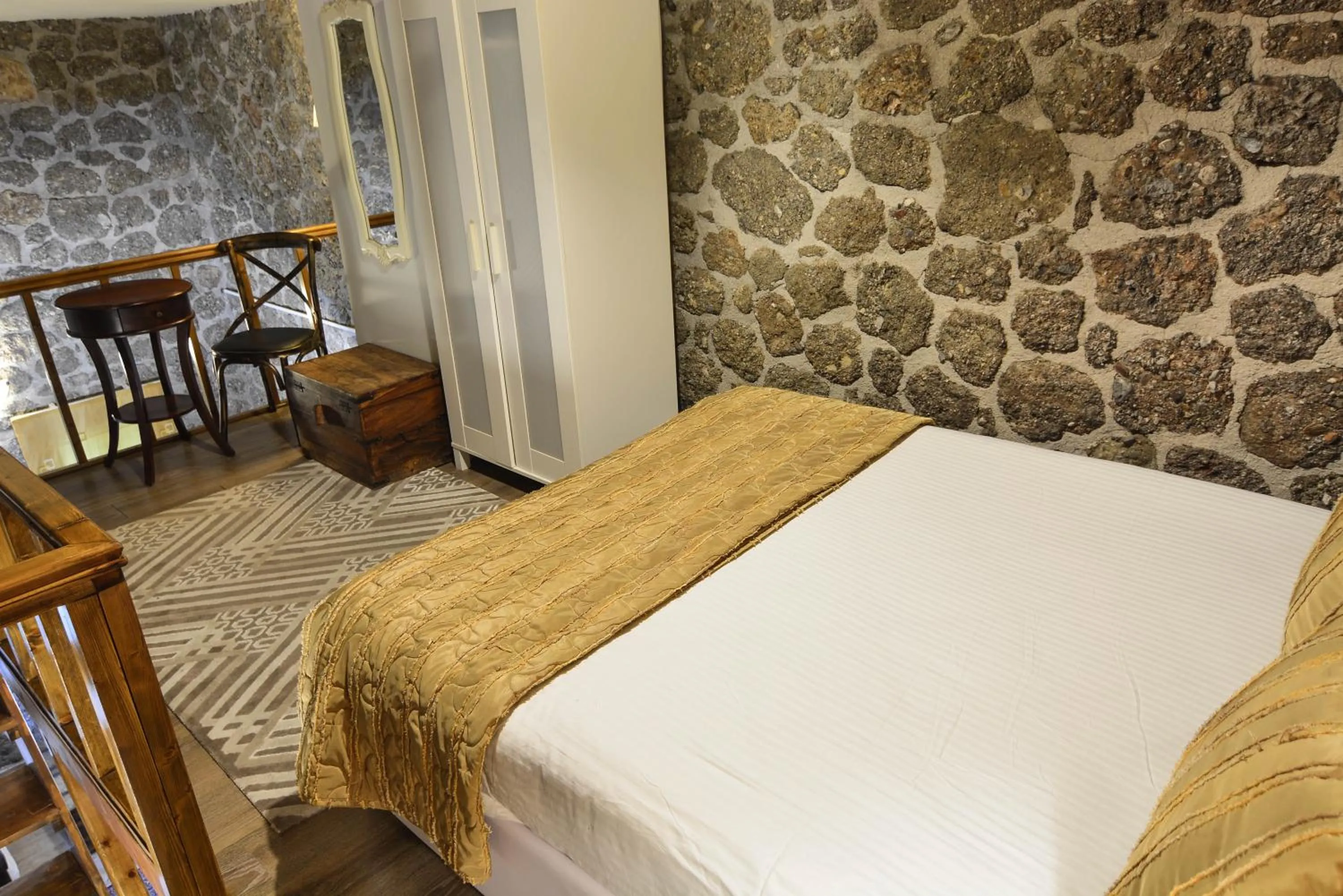 Bed in Trikalon Muses Art Suites