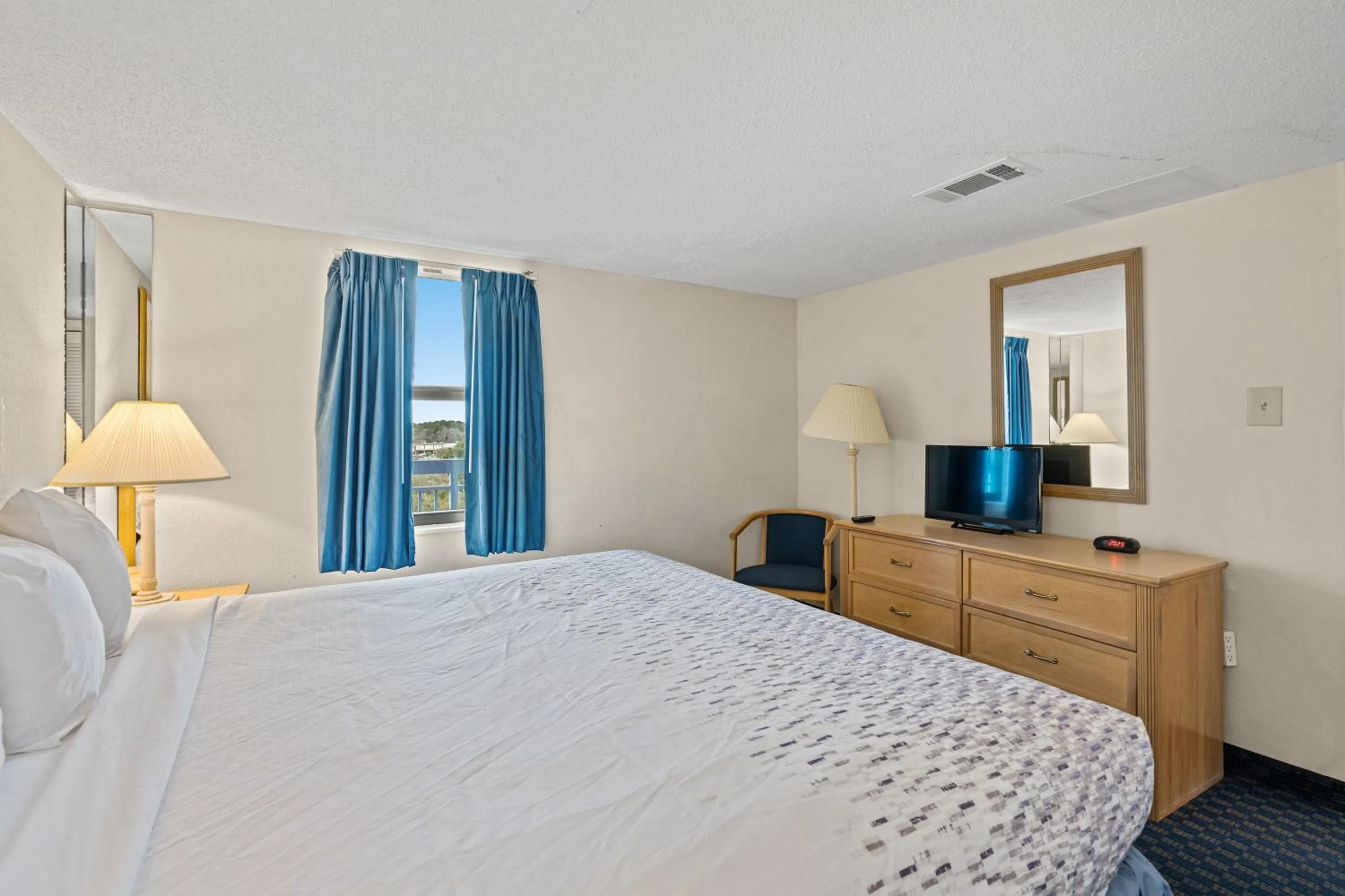 Bed in Yachtsman Oceanfront Resort