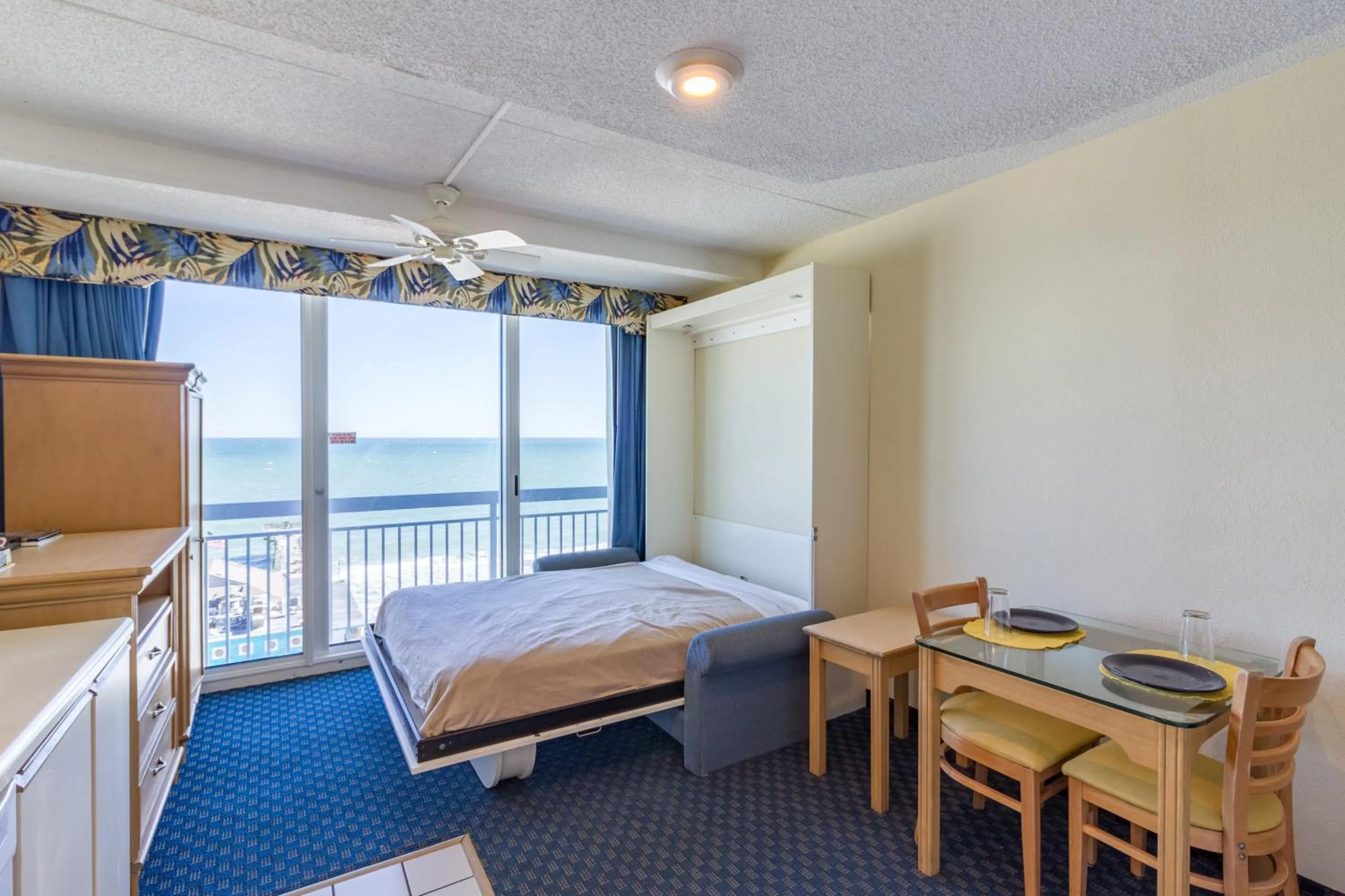 Bed in Yachtsman Oceanfront Resort