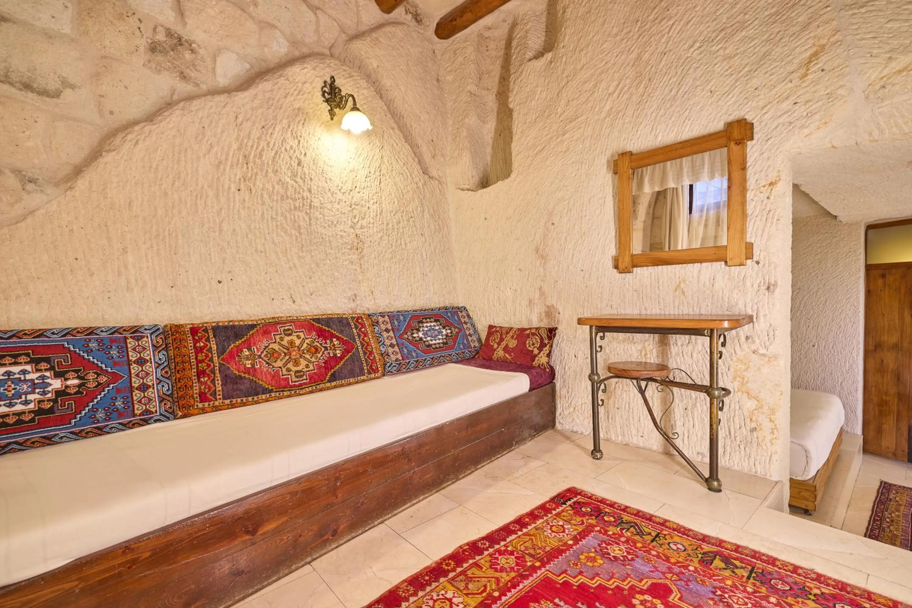 Seating area, Bed in Mithra Cave Cappadocia
