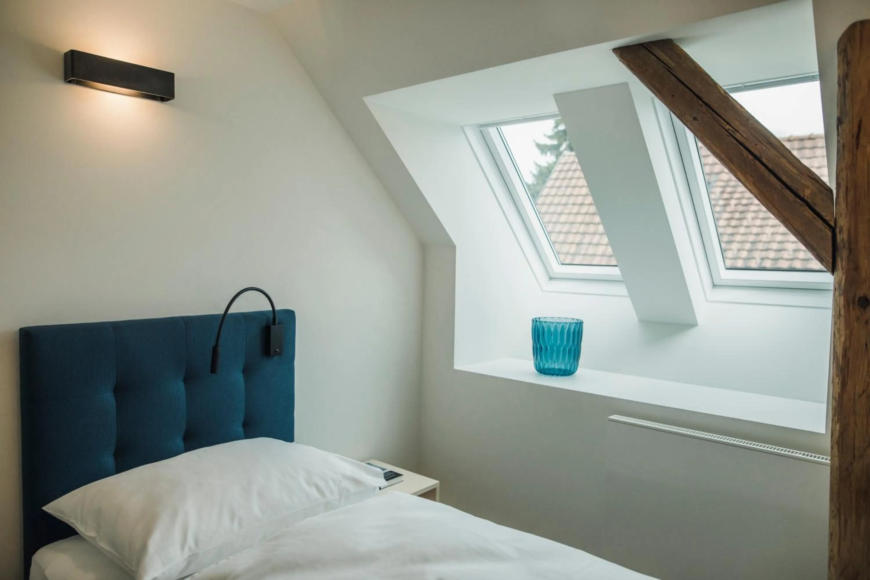 Photo of the whole room, Bed in Krone Hard - self check-in