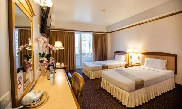 Bed in V.L. Hatyai Hotel