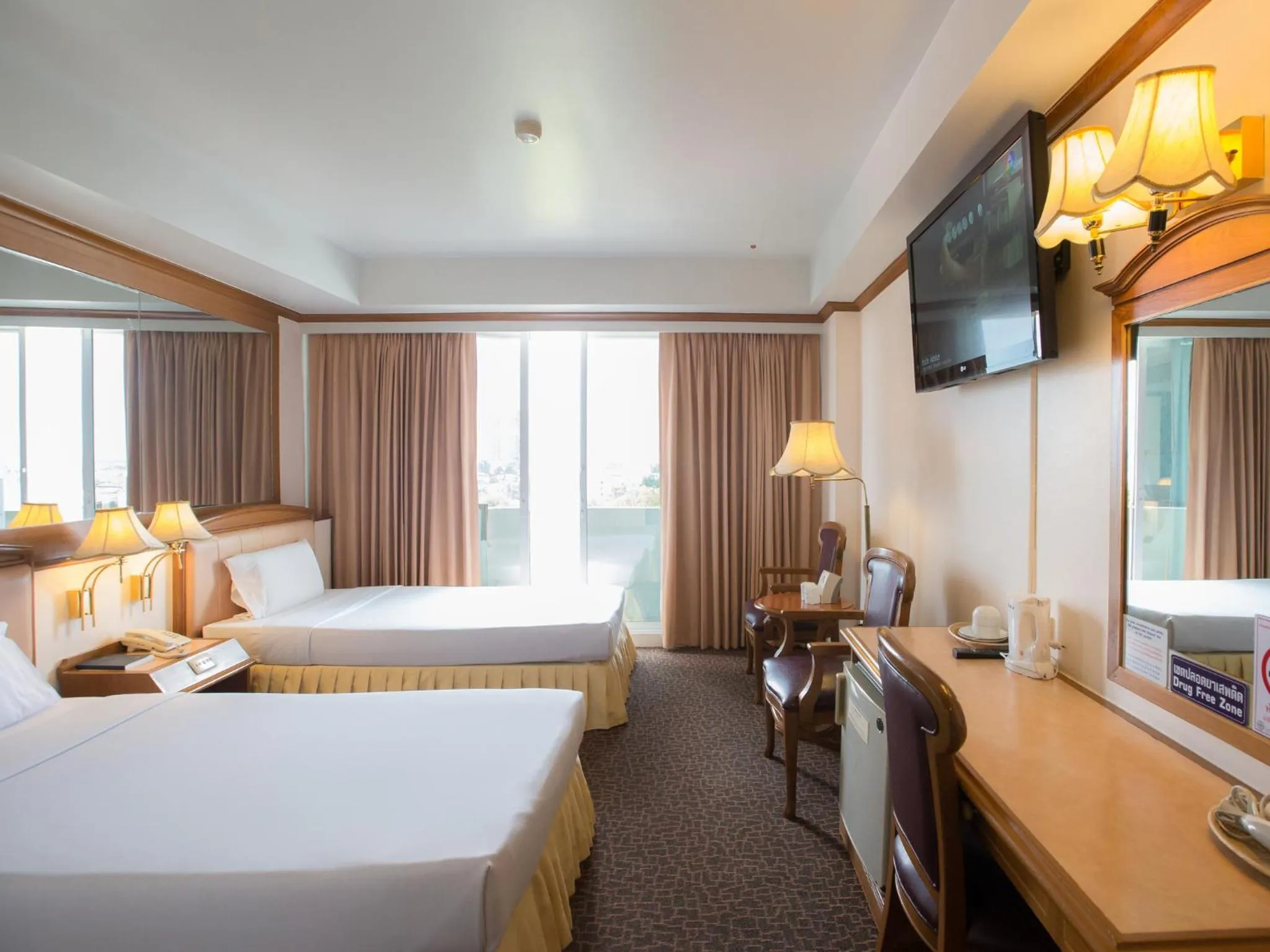 Bed in V.L. Hatyai Hotel