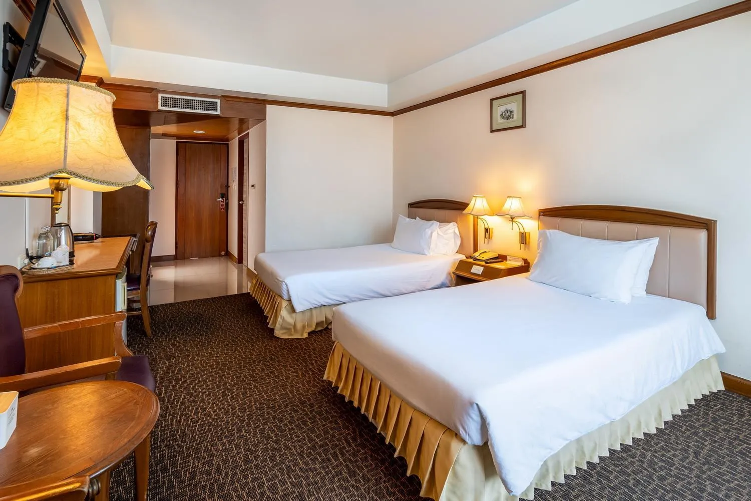 Bed in V.L. Hatyai Hotel