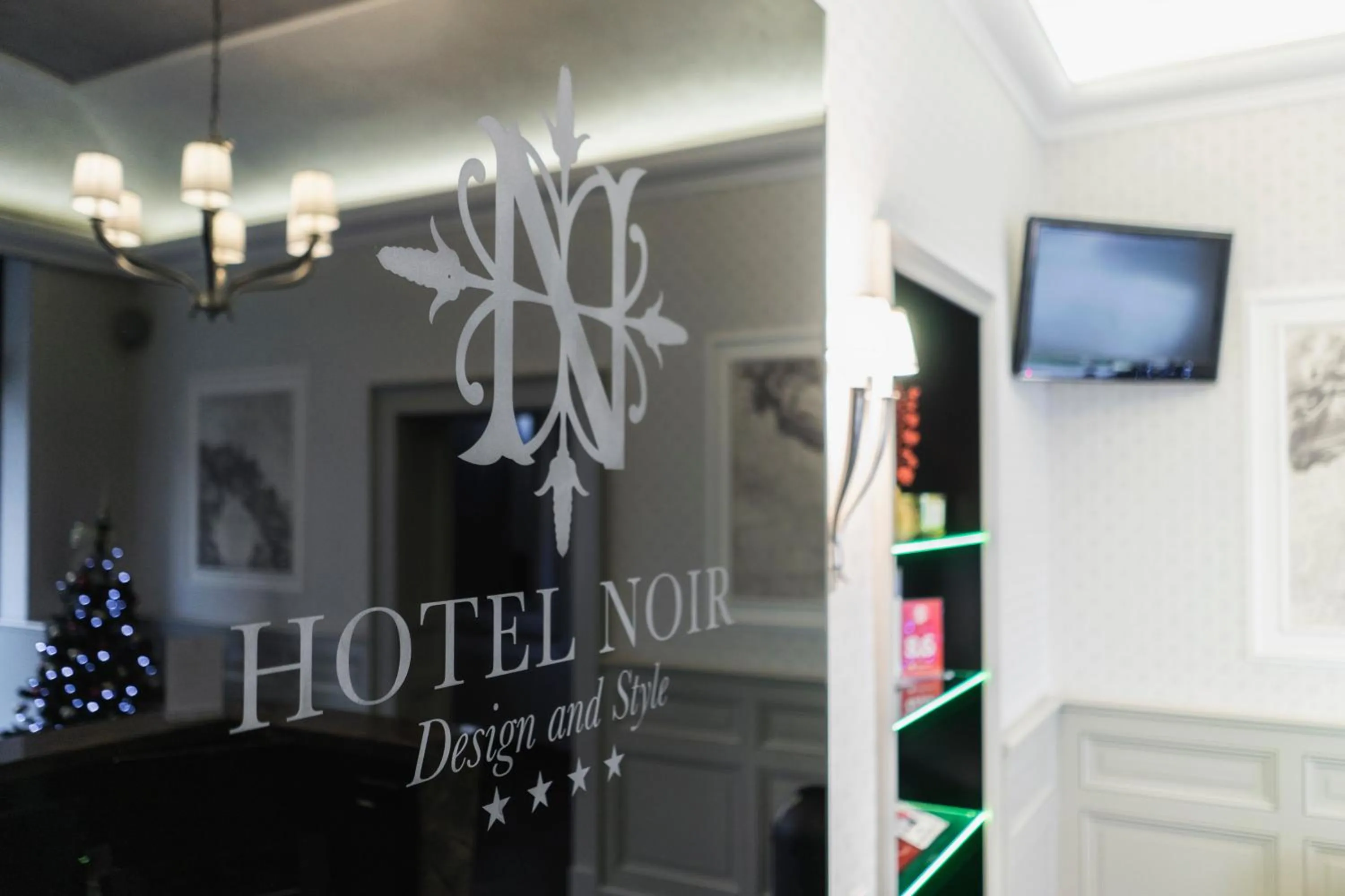 Property logo or sign in Hotel NOIR