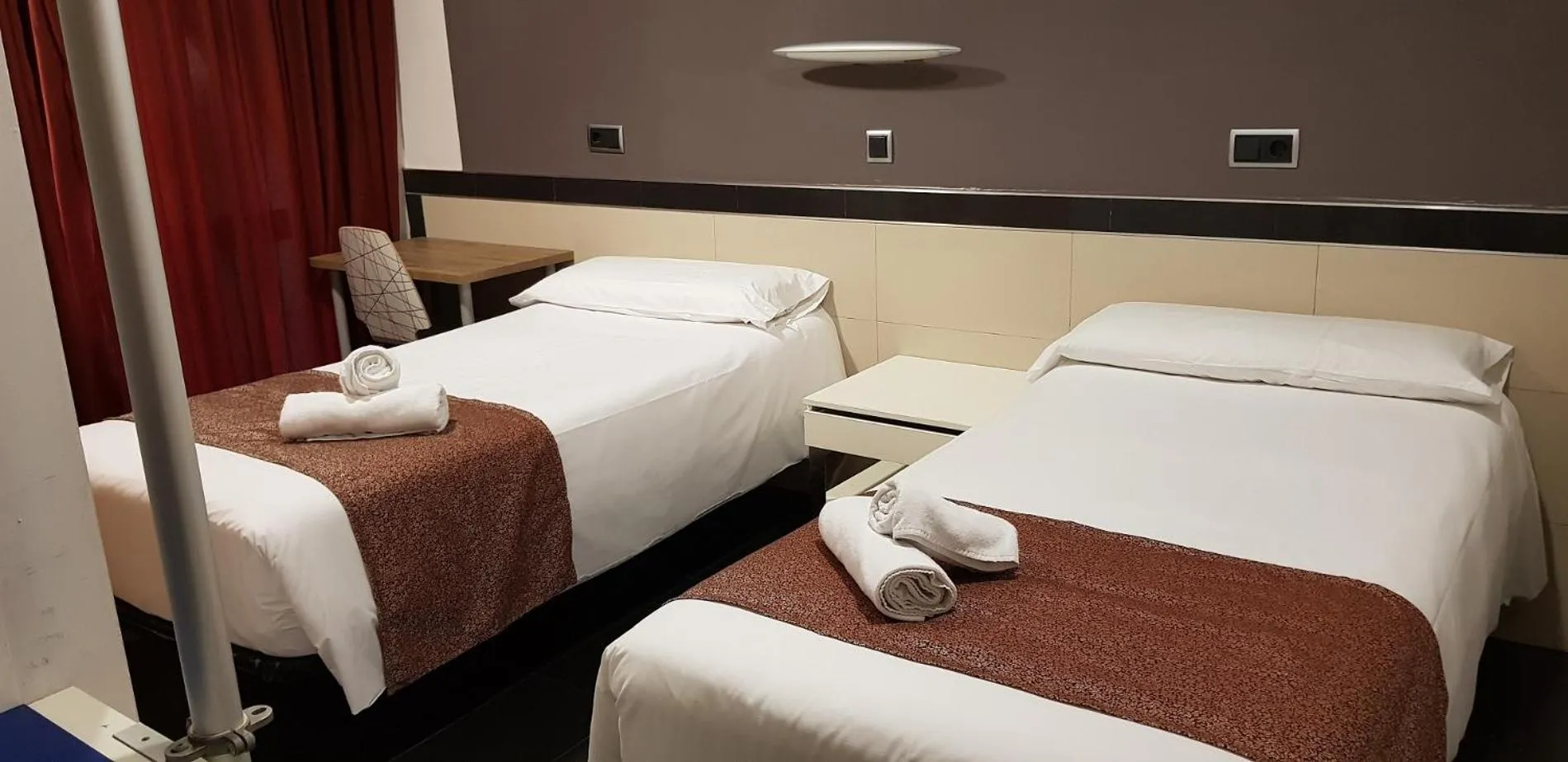 Bed in Hostal Levante Barcelona