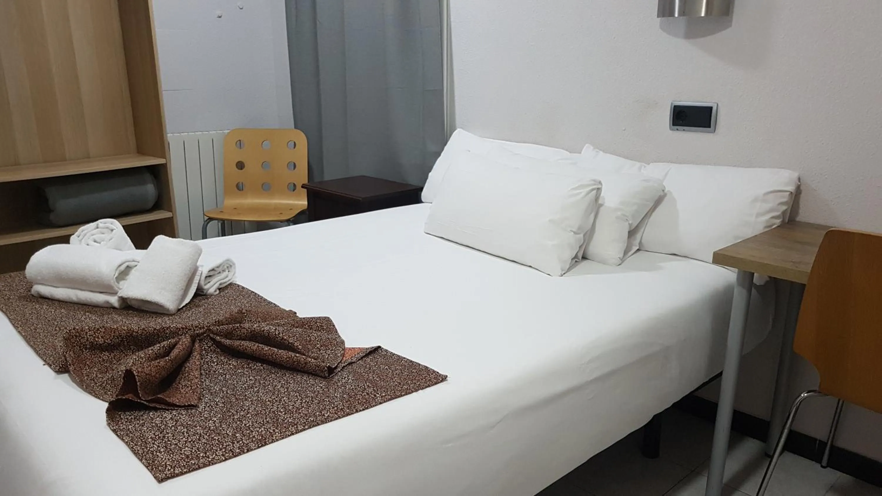 Bed in Hostal Levante Barcelona