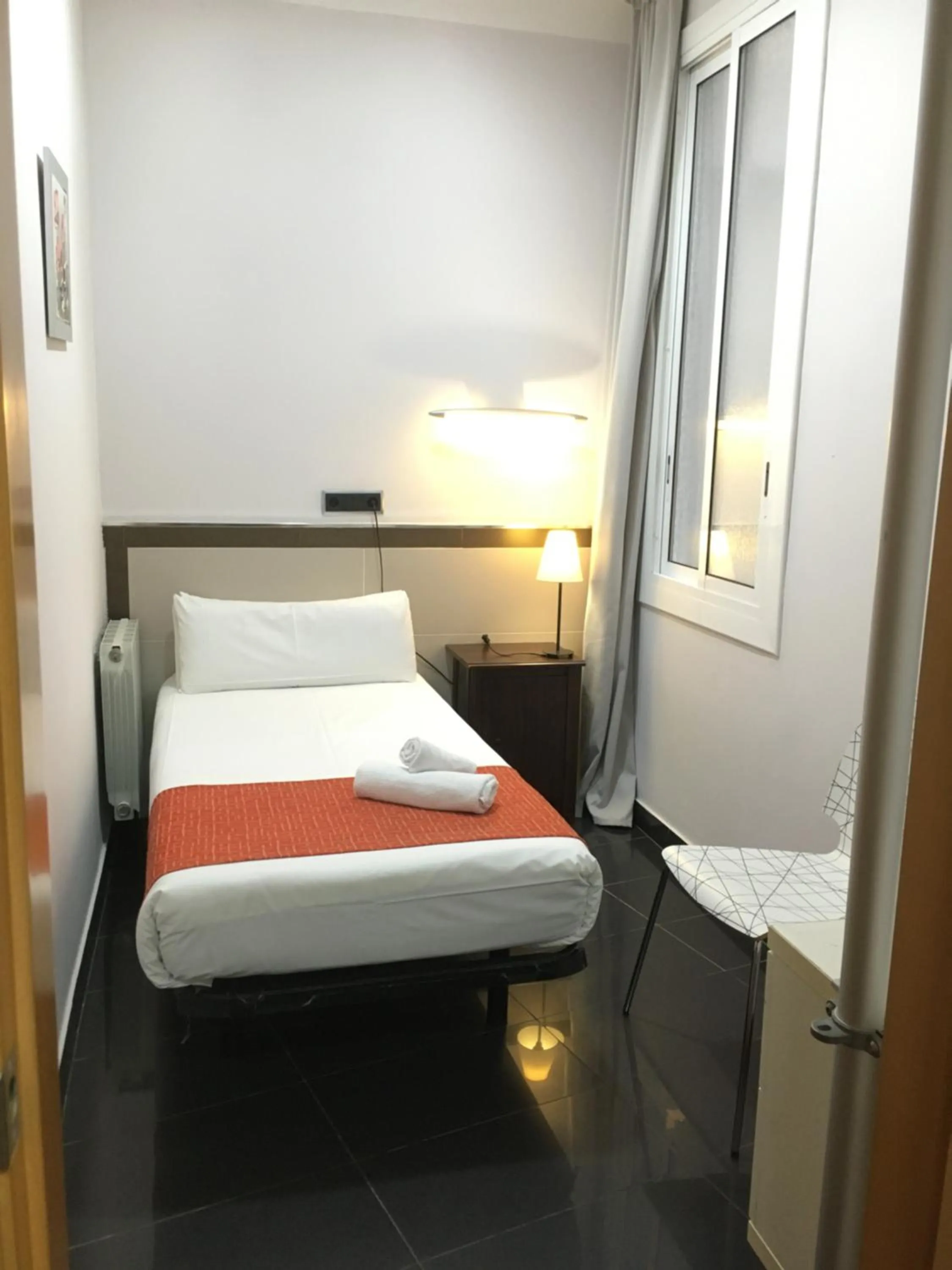 Bed in Hostal Levante Barcelona