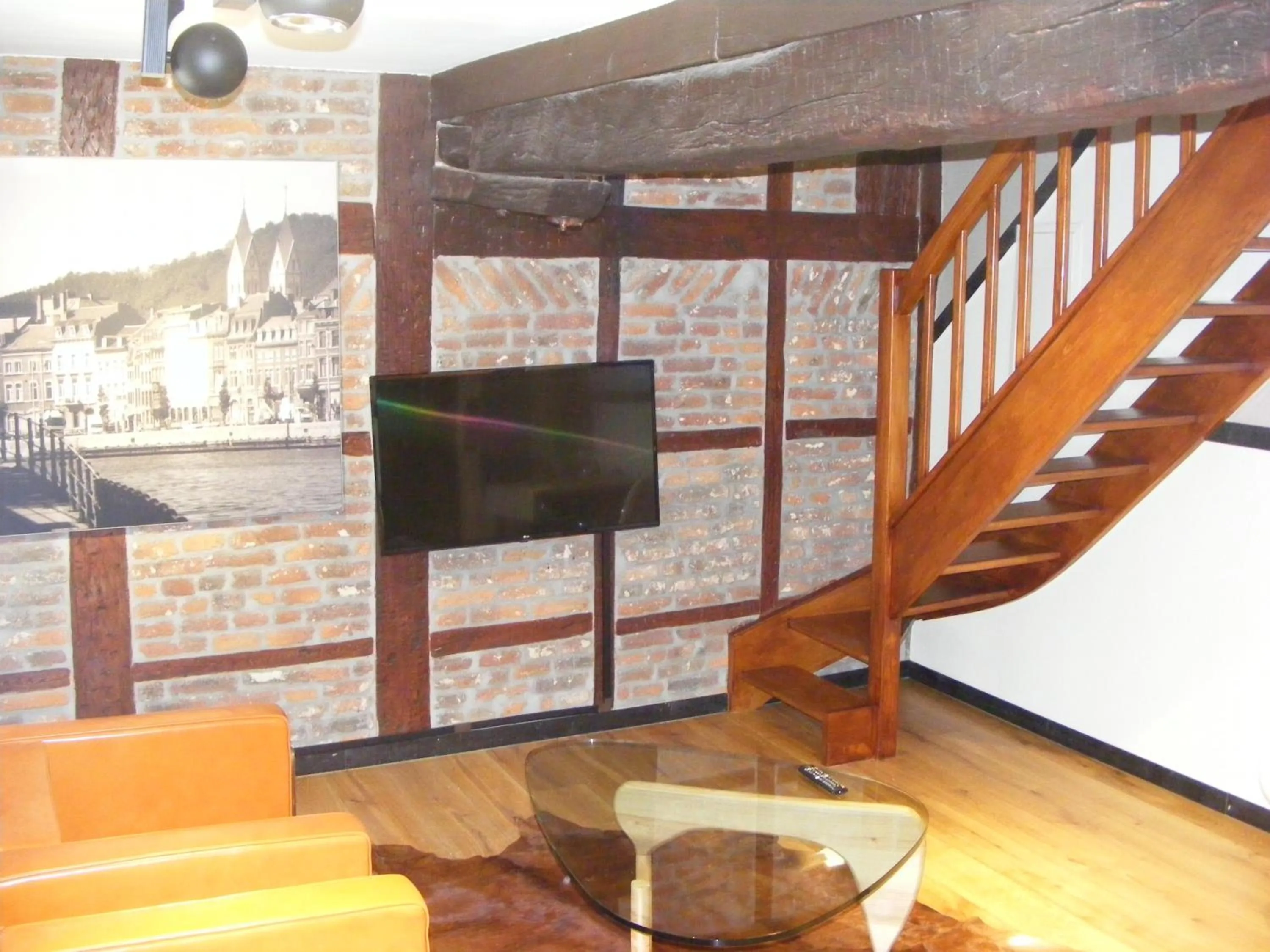 Living room in Amosa Liège City Centre Apart Gerardrie 17