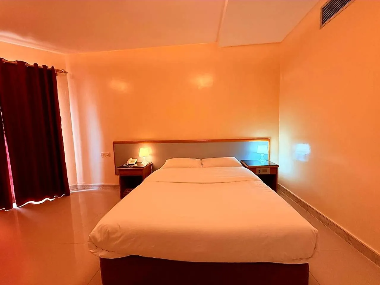 Bed in Al Buhaira Hotel Apartment