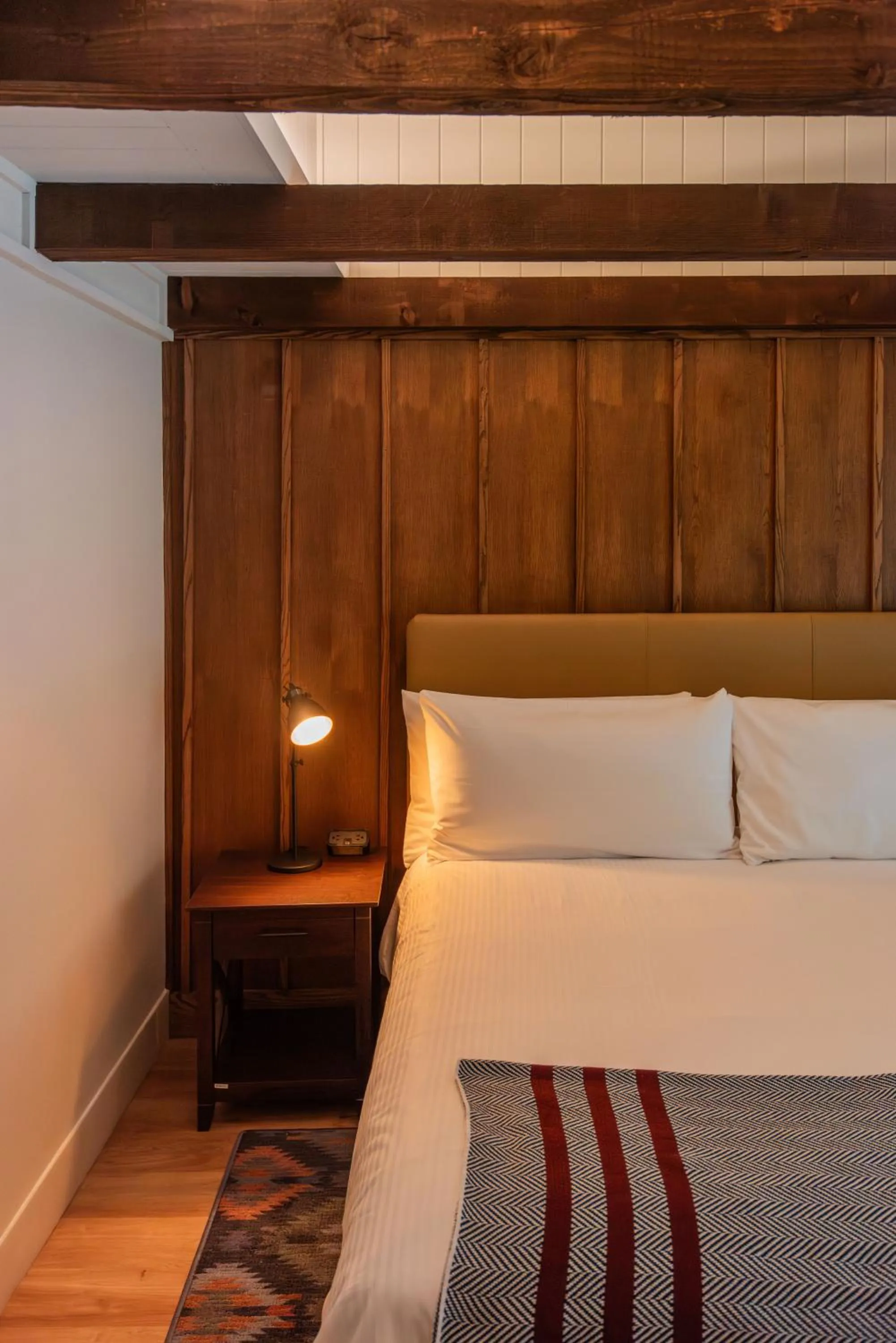 Bed in Historic Rocky Waters Inn, A Small Luxury Hotel