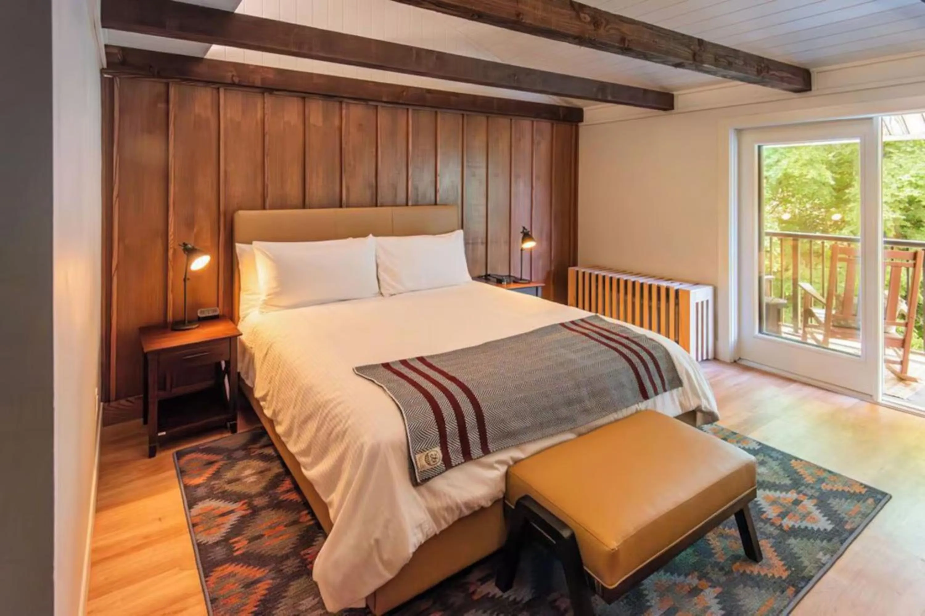Bed in Historic Rocky Waters Inn, A Small Luxury Hotel