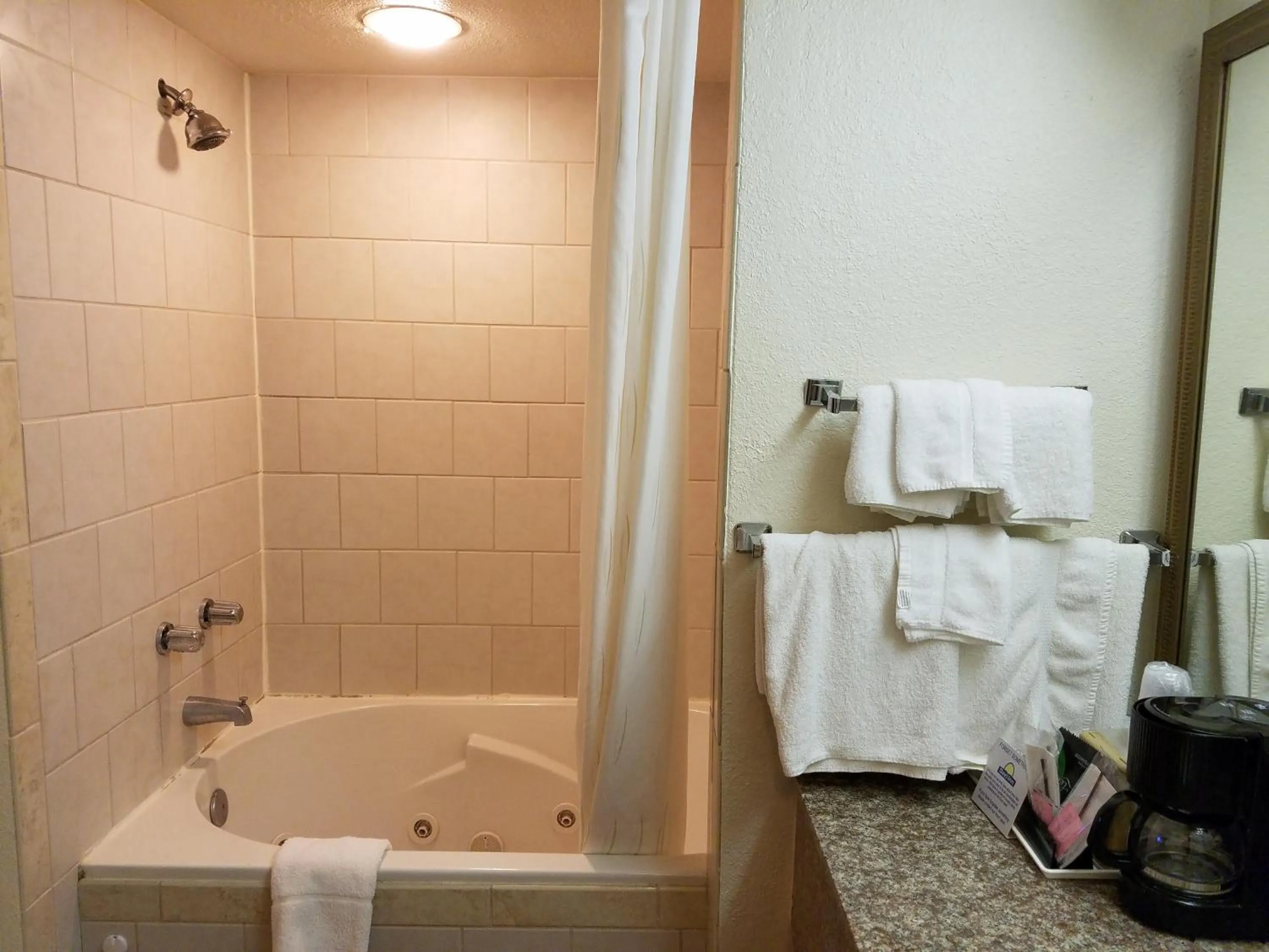 Bathroom in Days Inn by Wyndham Leesville