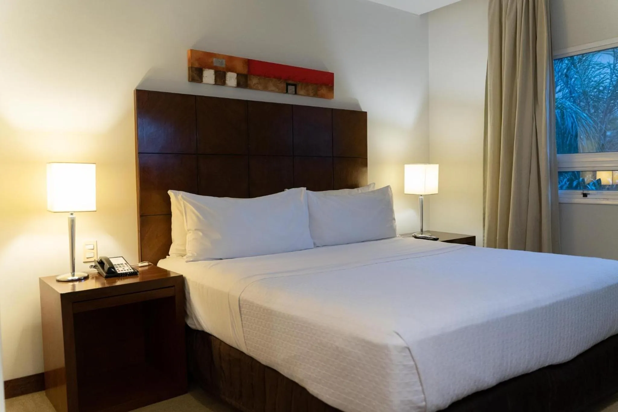 Photo of the whole room, Bed in Crowne Plaza Asunción by IHG