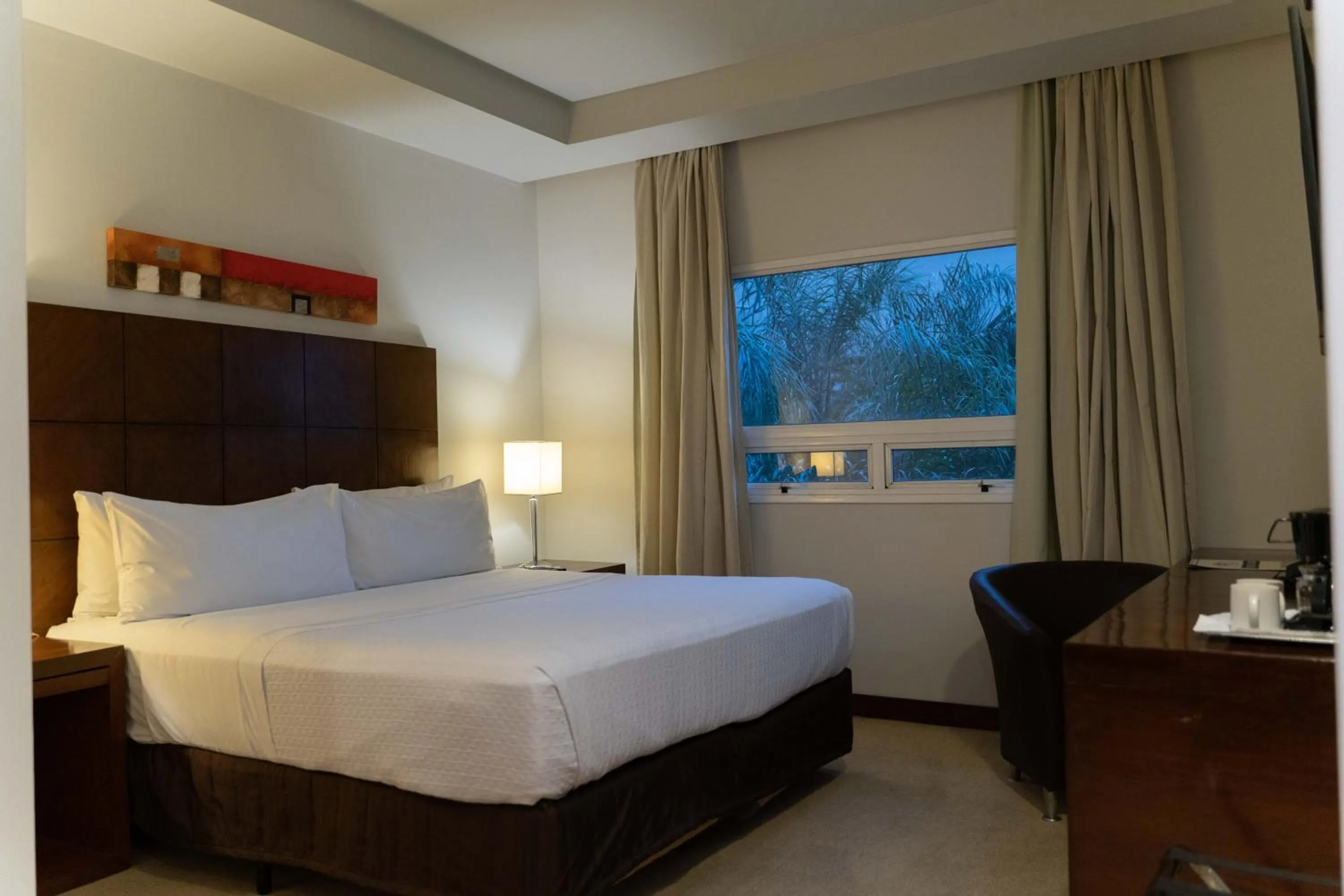 Photo of the whole room, Bed in Crowne Plaza Asunción by IHG