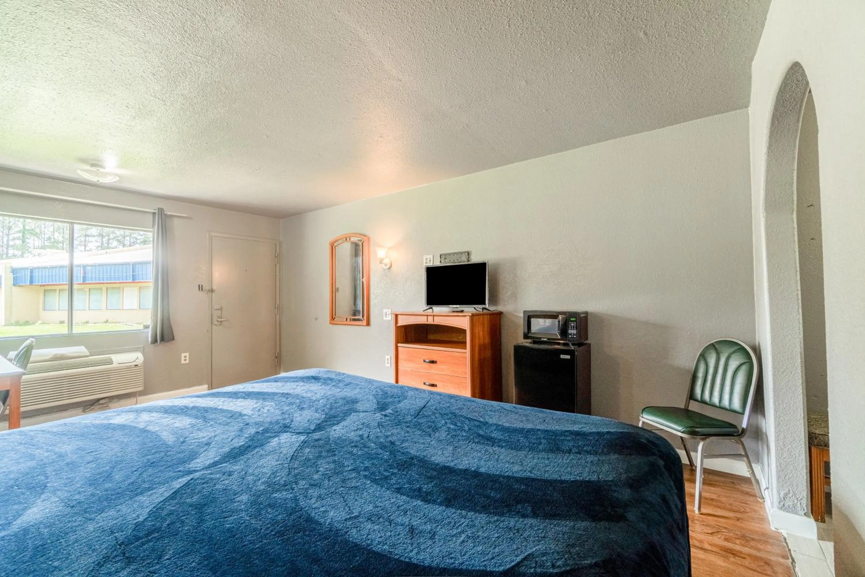 Bedroom, Bed in Economy Inn By OYO Livingston TX Hwy 59