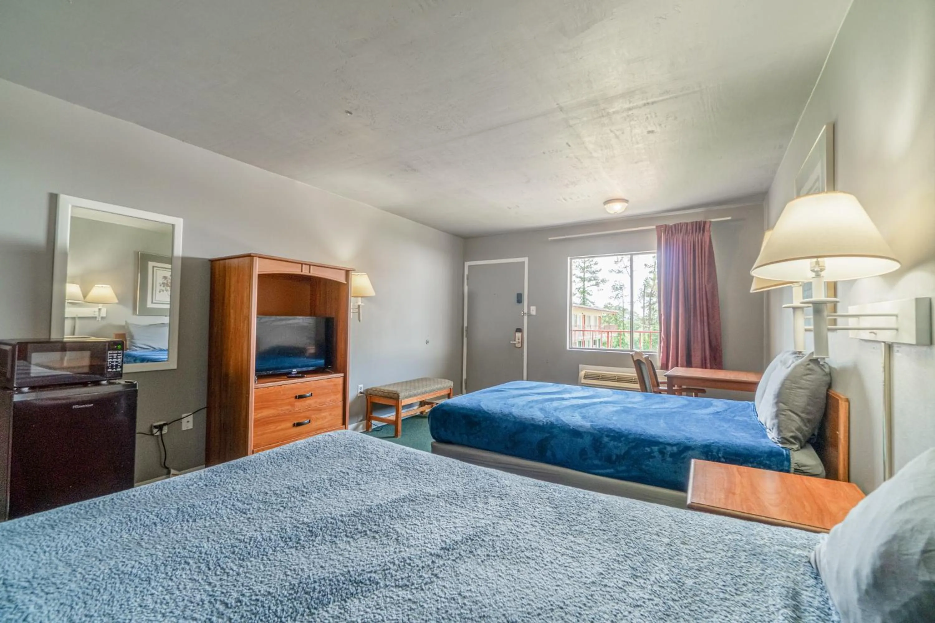 Bedroom, Bed in Economy Inn By OYO Livingston TX Hwy 59