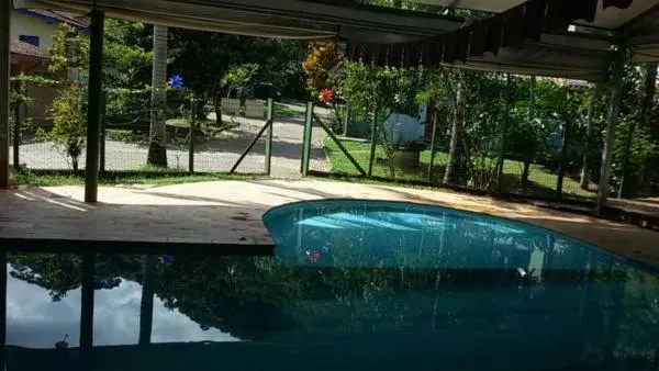 Swimming pool in Alegria casa 3 dorms Cond Fechado churrasqueira piscina