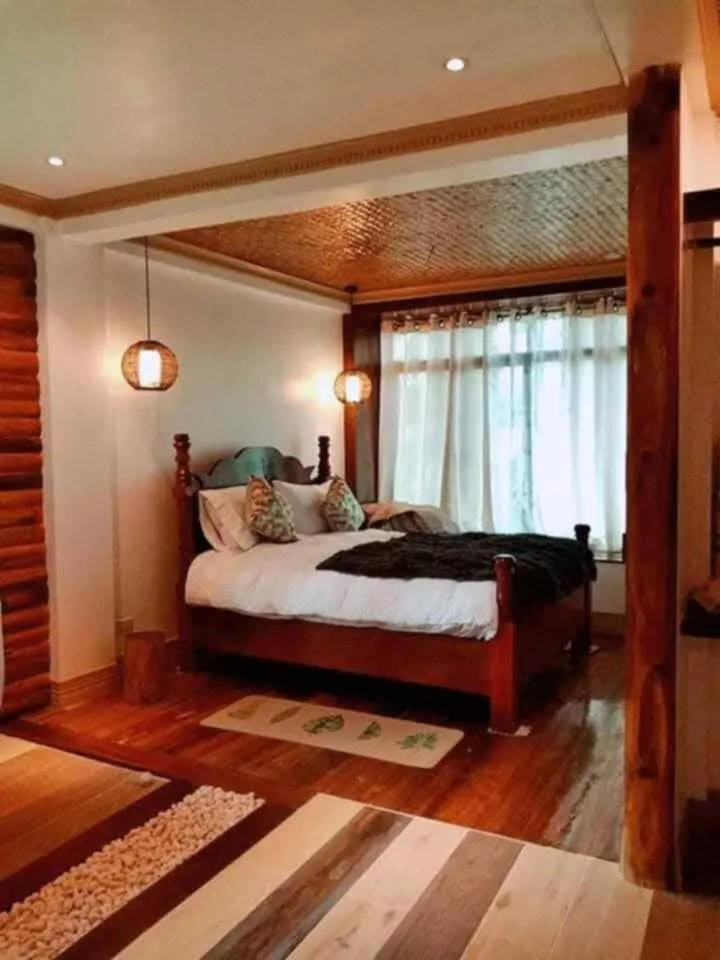 Bed in Peak View Resort