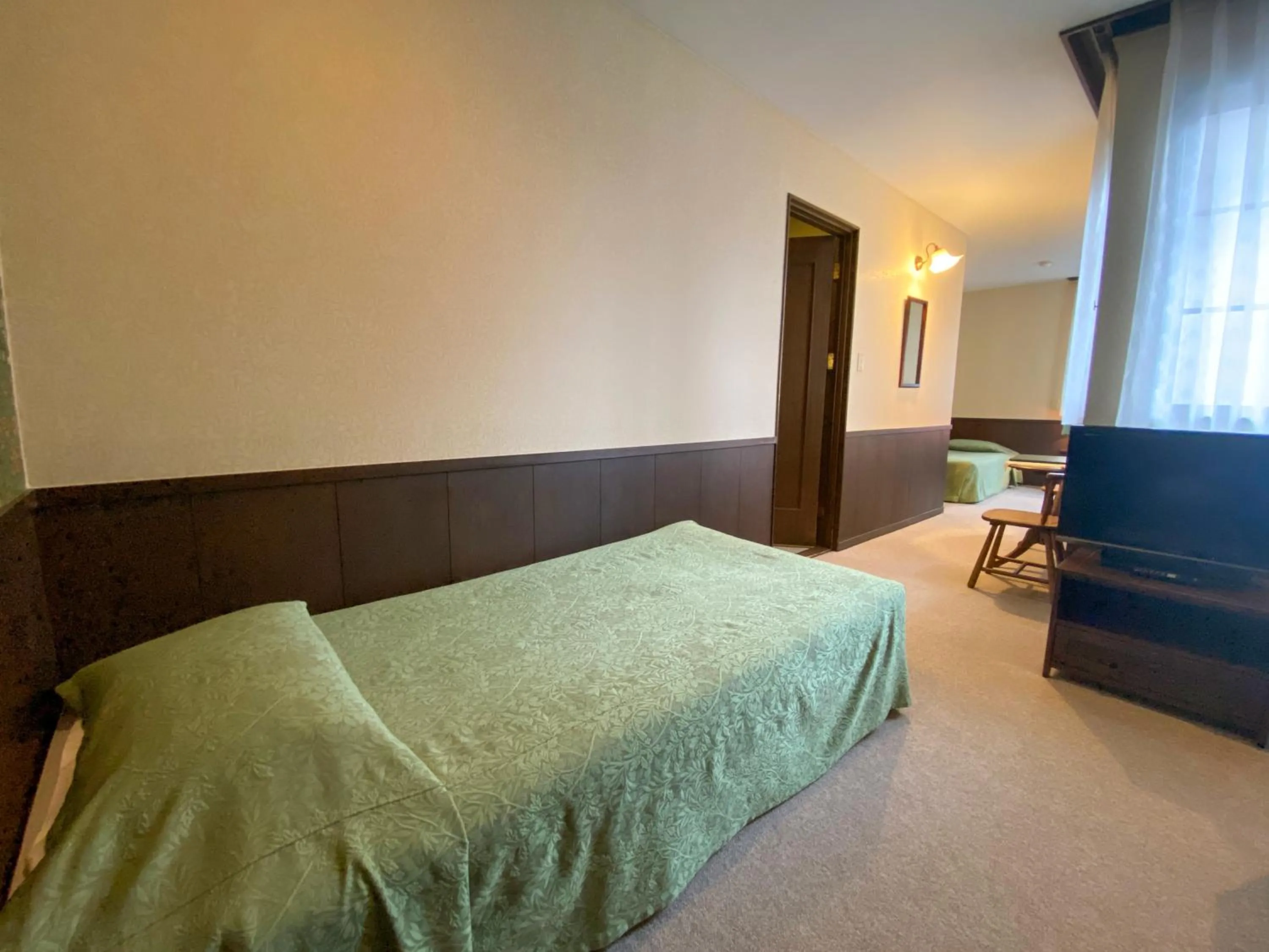 Bed in Camellia Inn Yukitsubaki