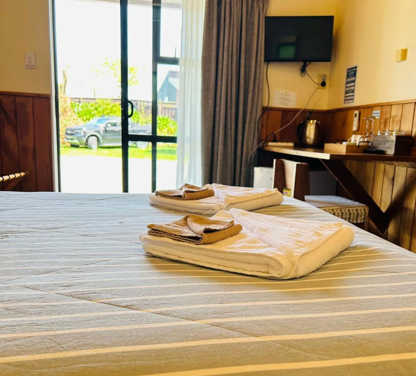 Bed in Mystery Creek Motel