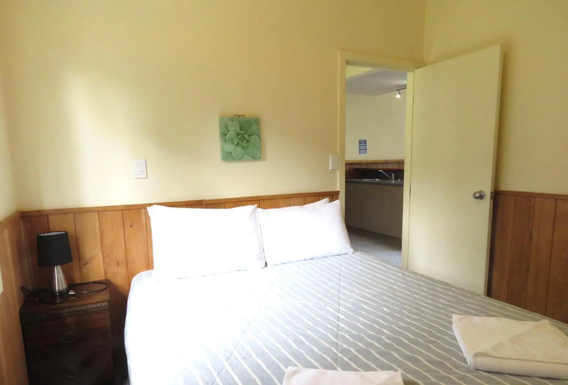 Bed in Mystery Creek Motel